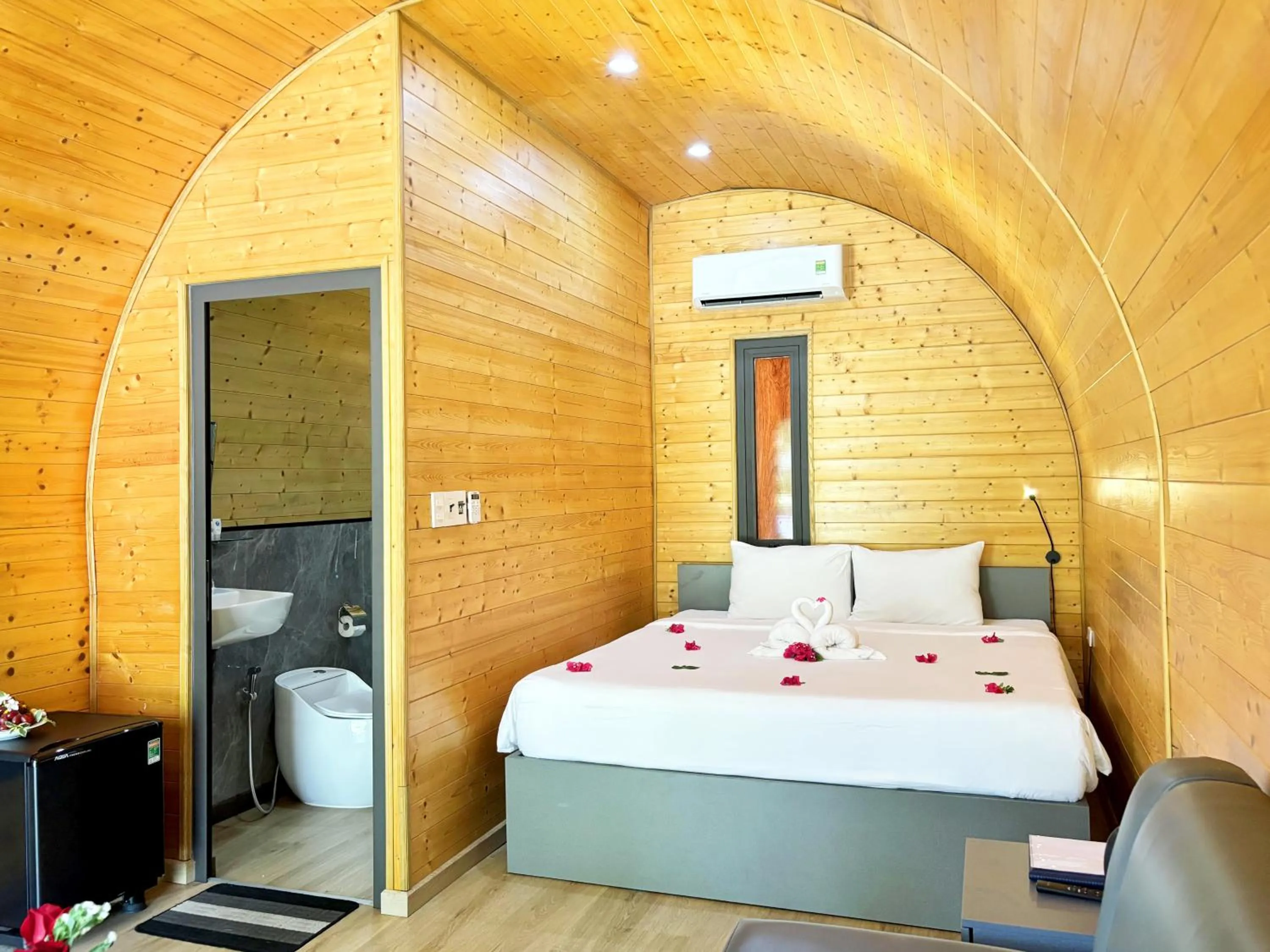 Bed in KIGI Beach Resort