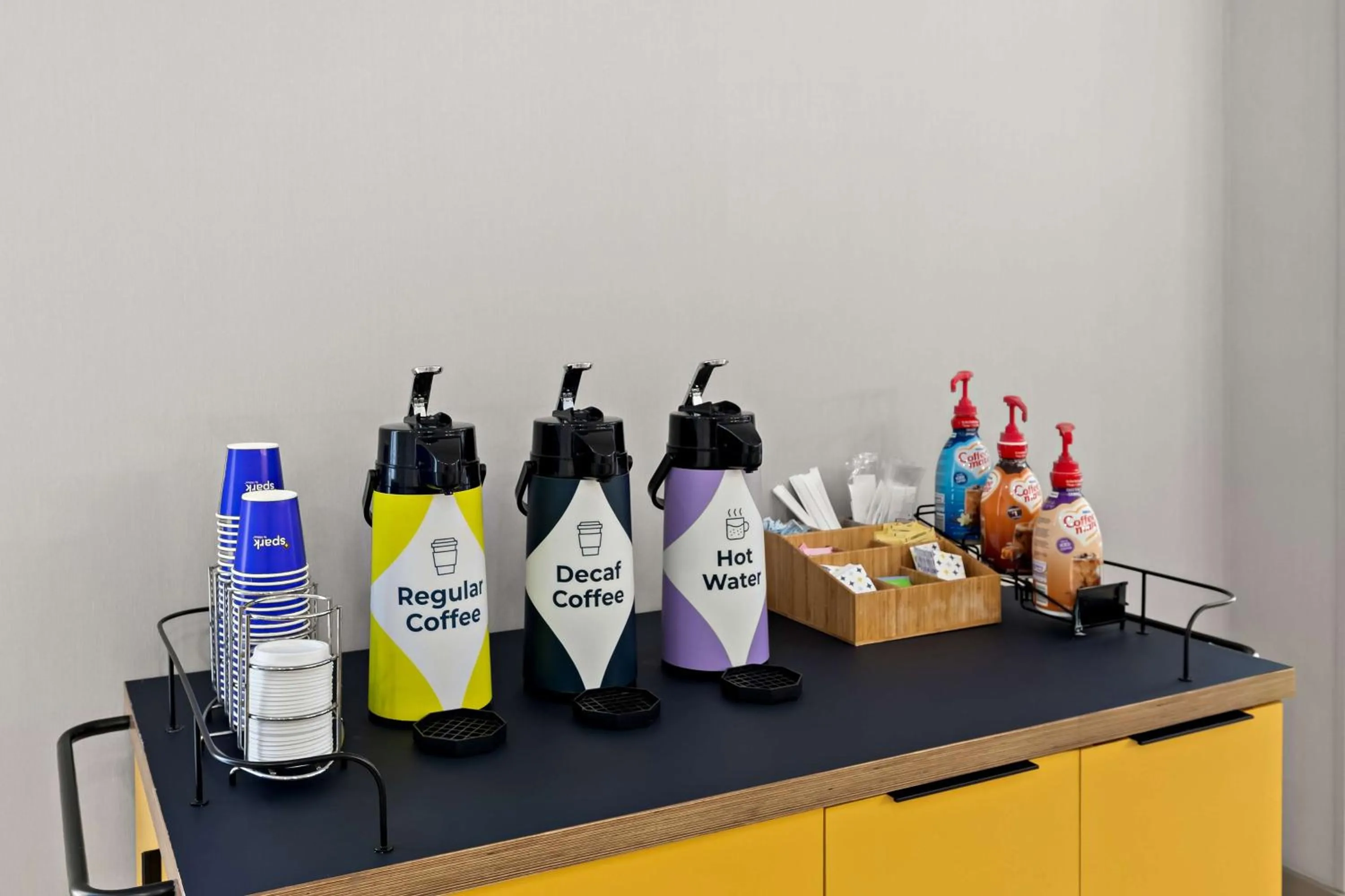 Dining area in Spark by Hilton Little Rock West