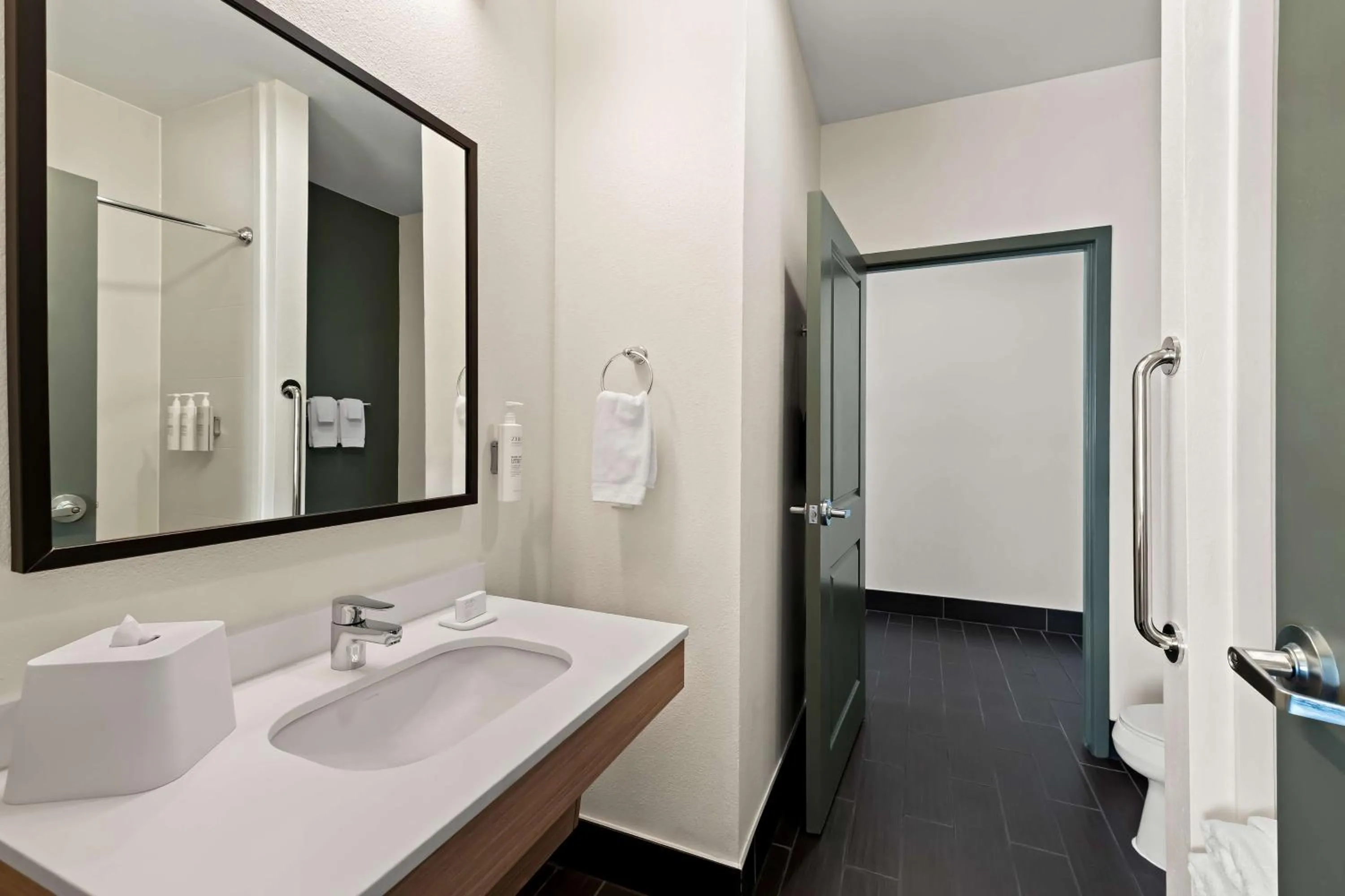 Bathroom in Spark by Hilton Little Rock West