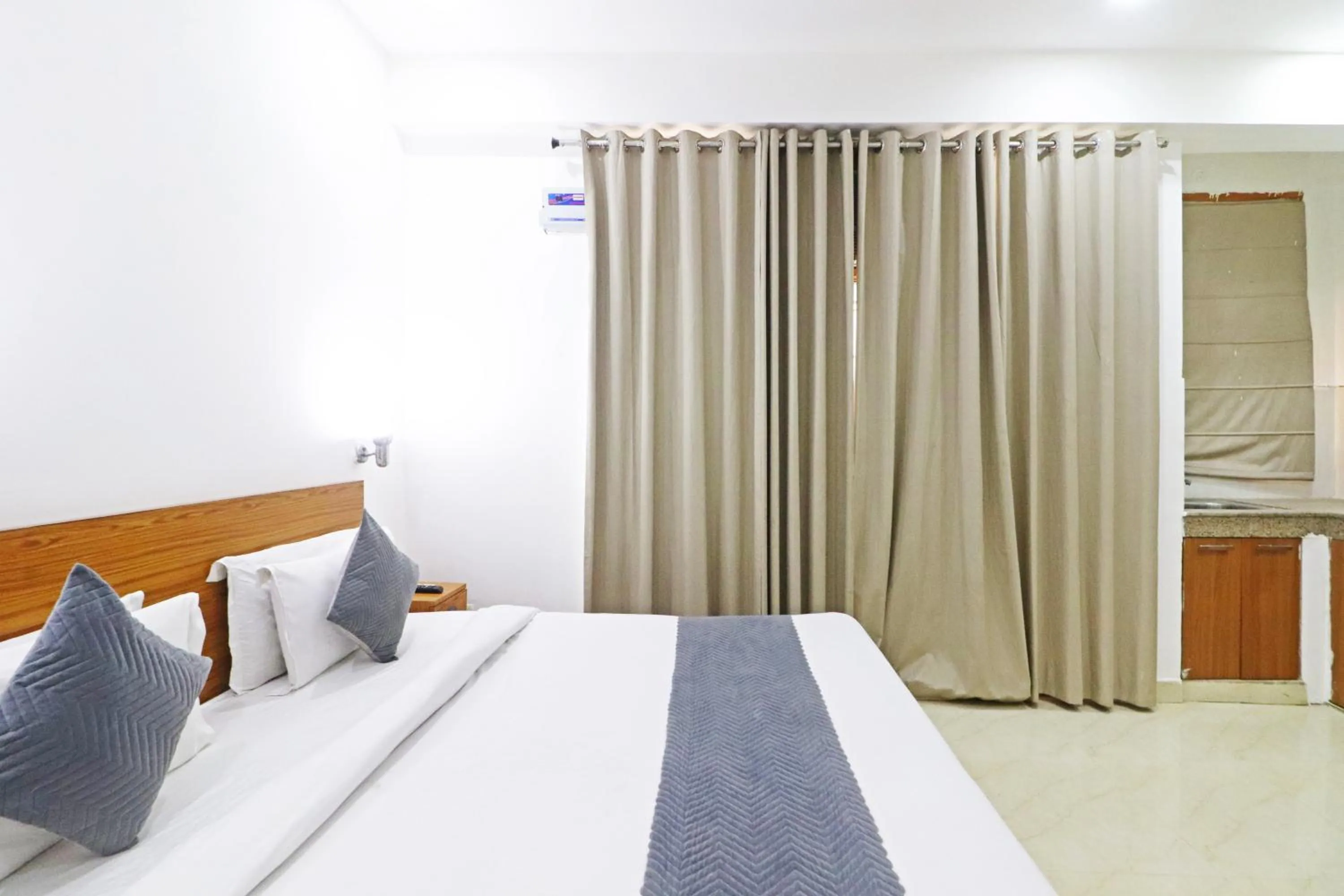 Bed in Mauryan Elite Hotel Chhatarpur Metro Station