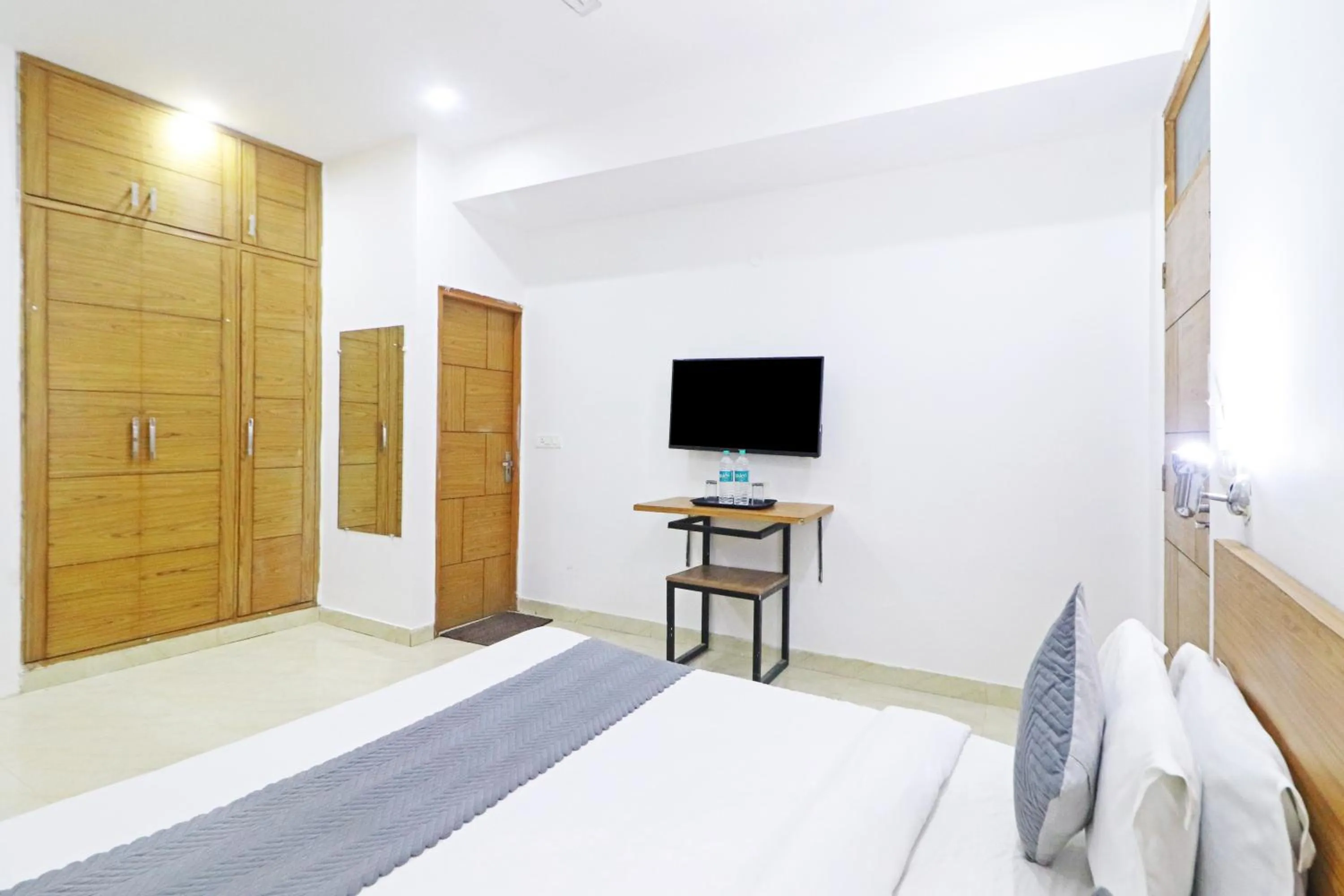Bed in Mauryan Elite Hotel Chhatarpur Metro Station