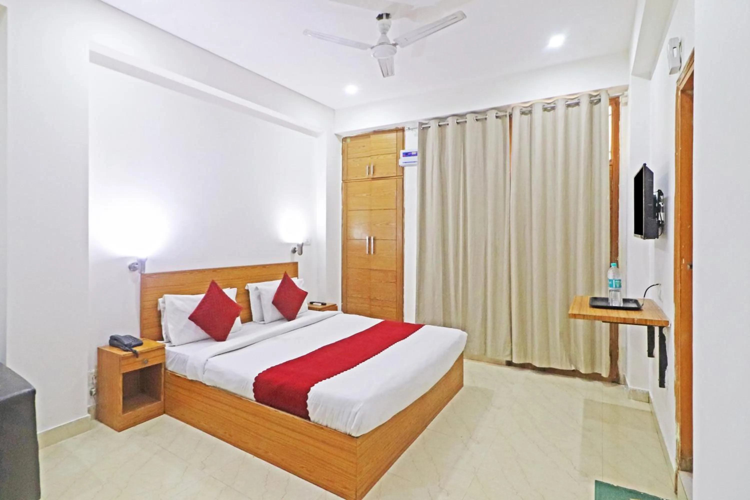 Bed in Mauryan Elite Hotel Chhatarpur Metro Station