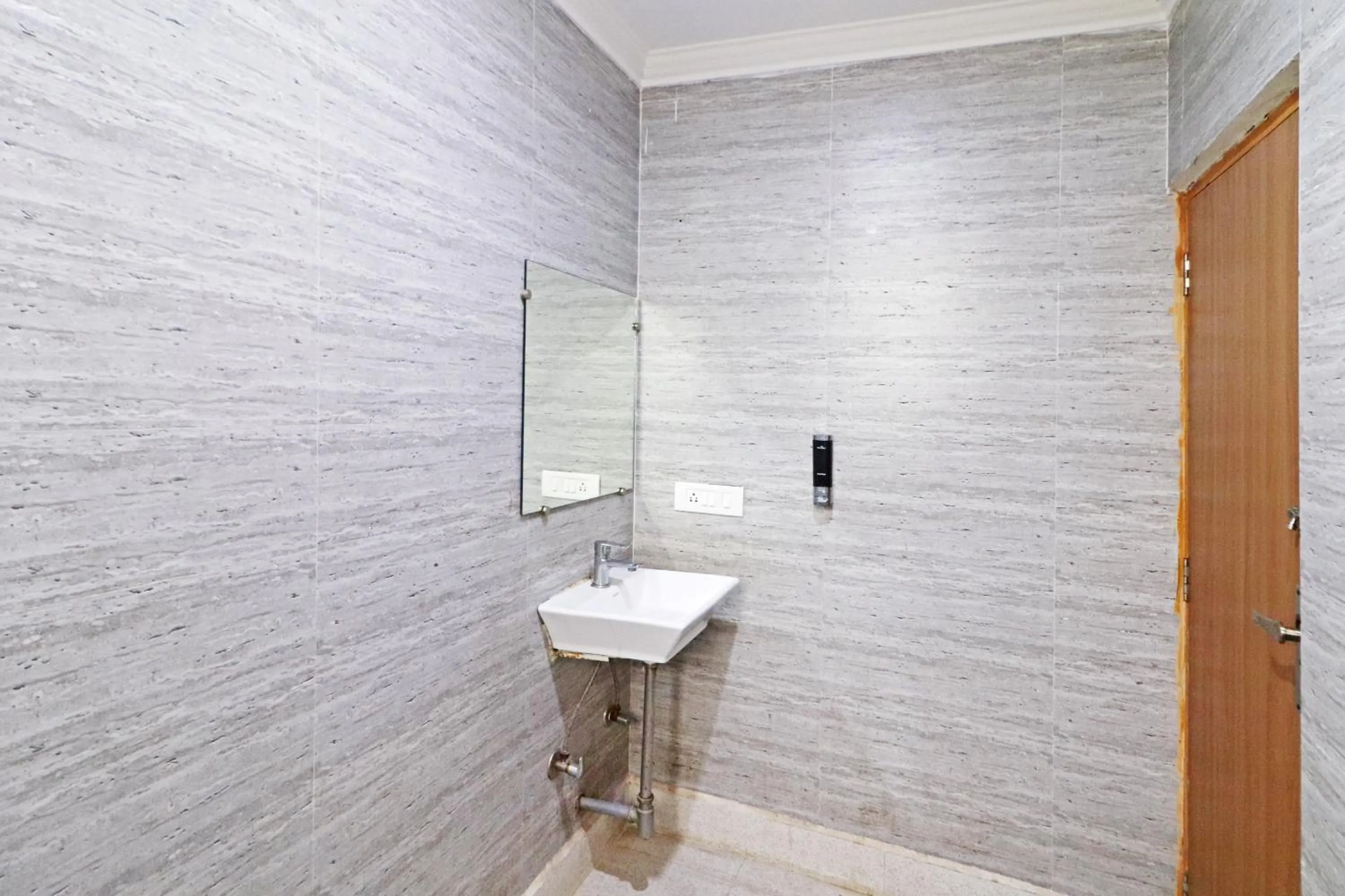 Shower in Mauryan Elite Hotel Chhatarpur Metro Station