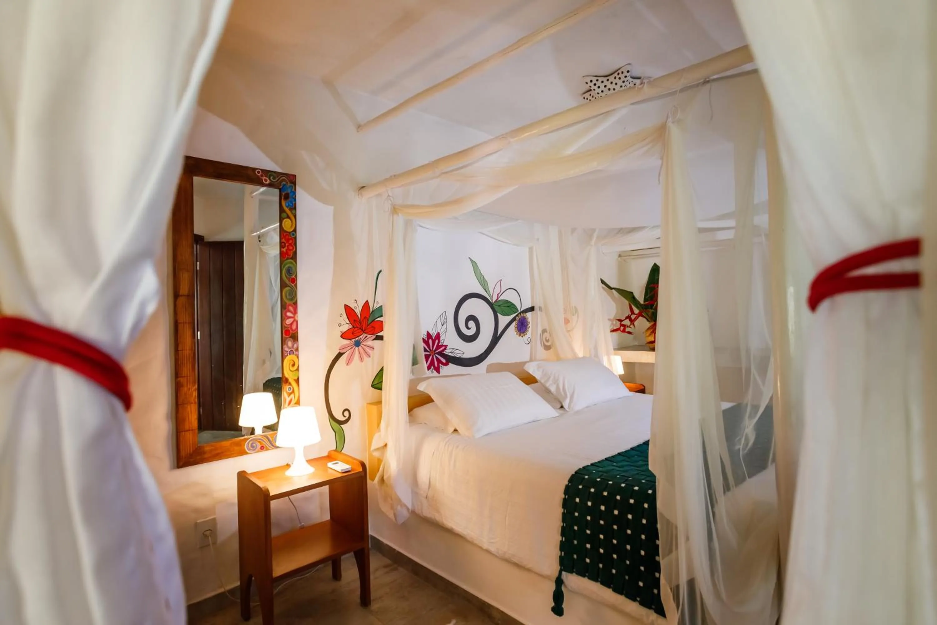 Bed in Pousada Rigatoni