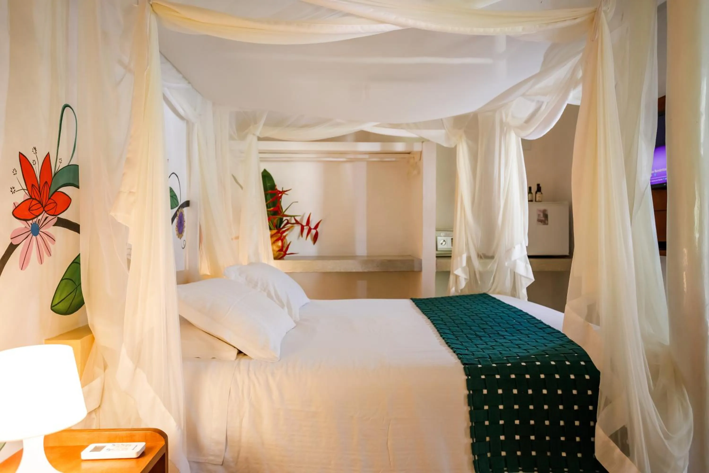 Bed in Pousada Rigatoni