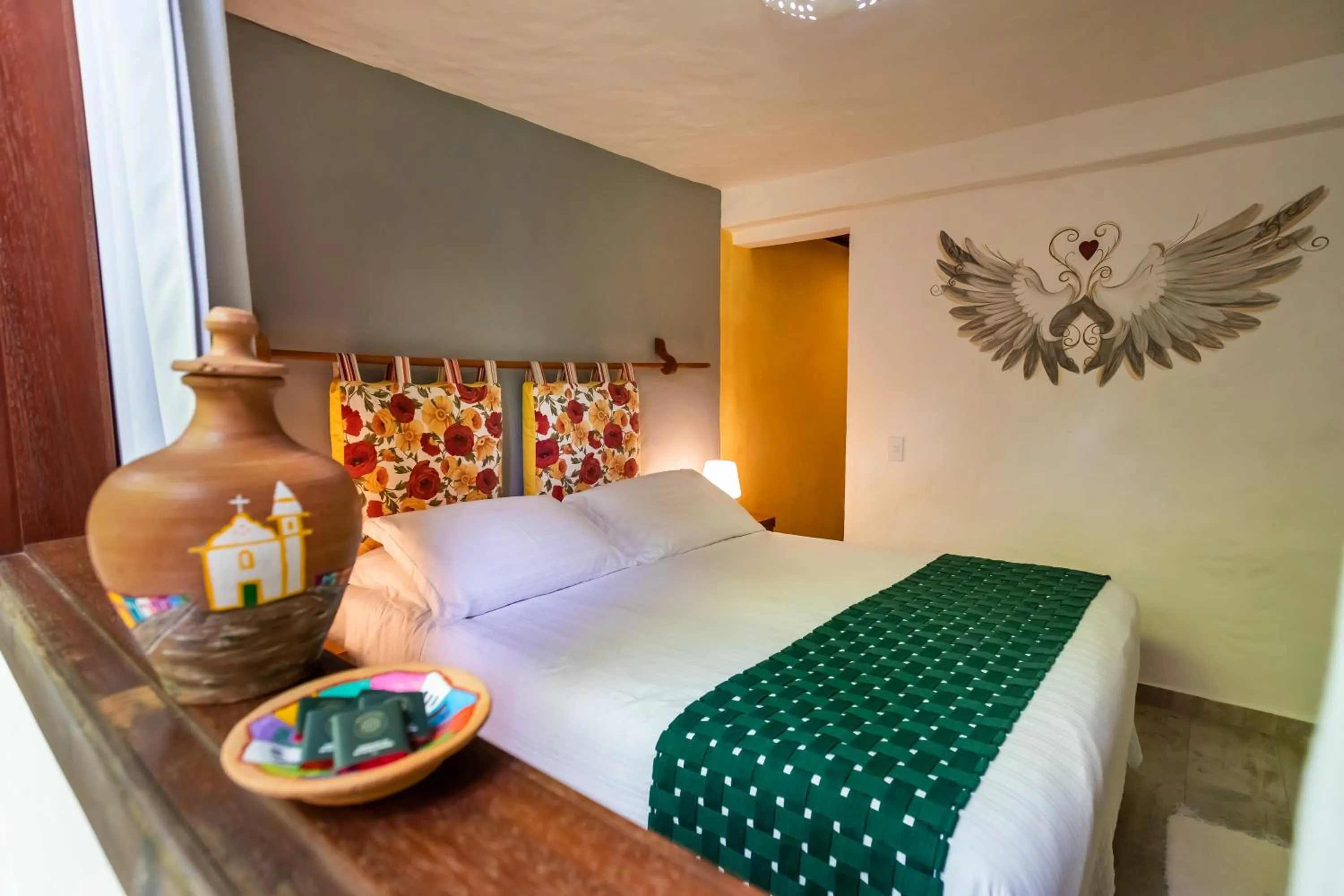 Bed in Pousada Rigatoni