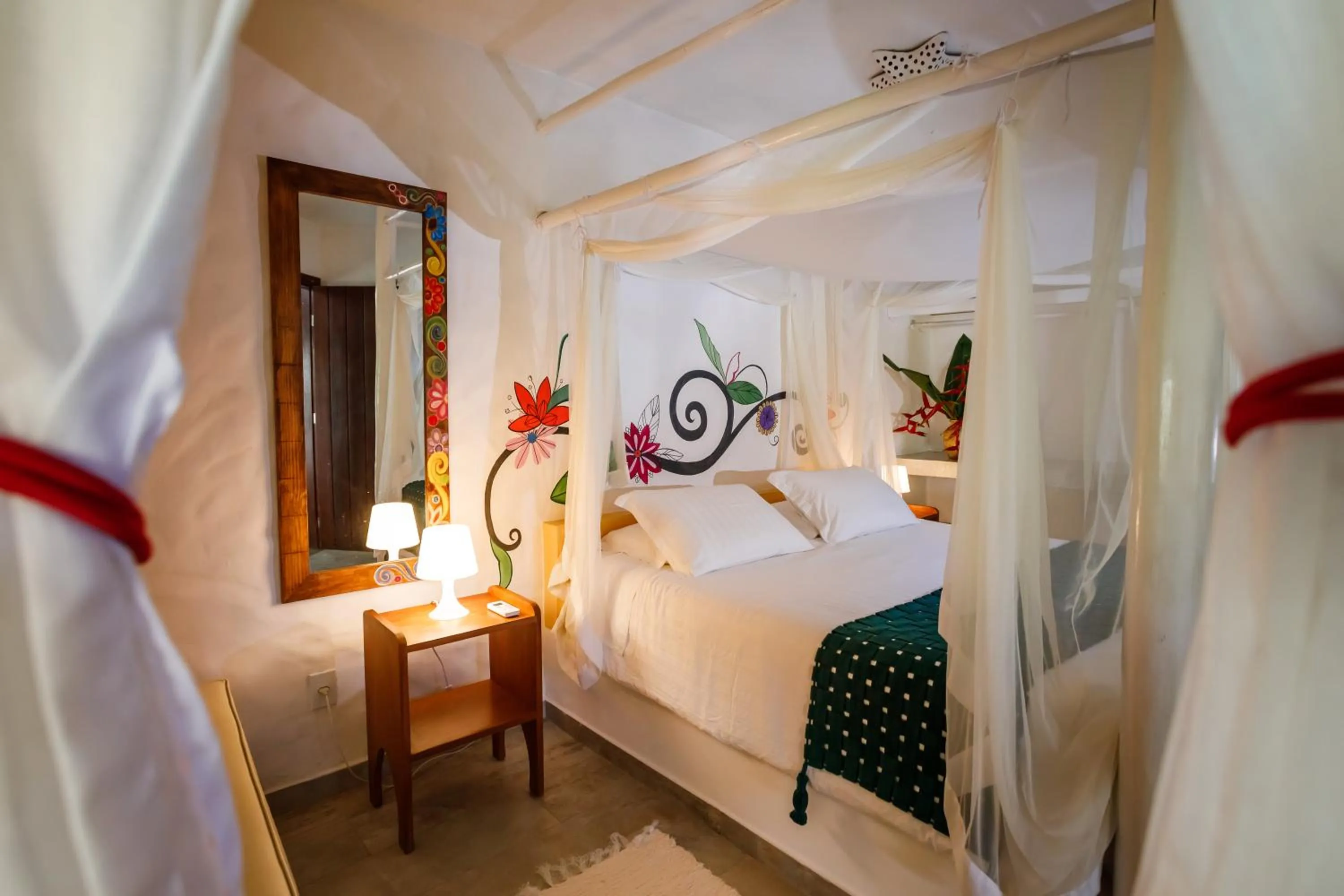 Bed in Pousada Rigatoni