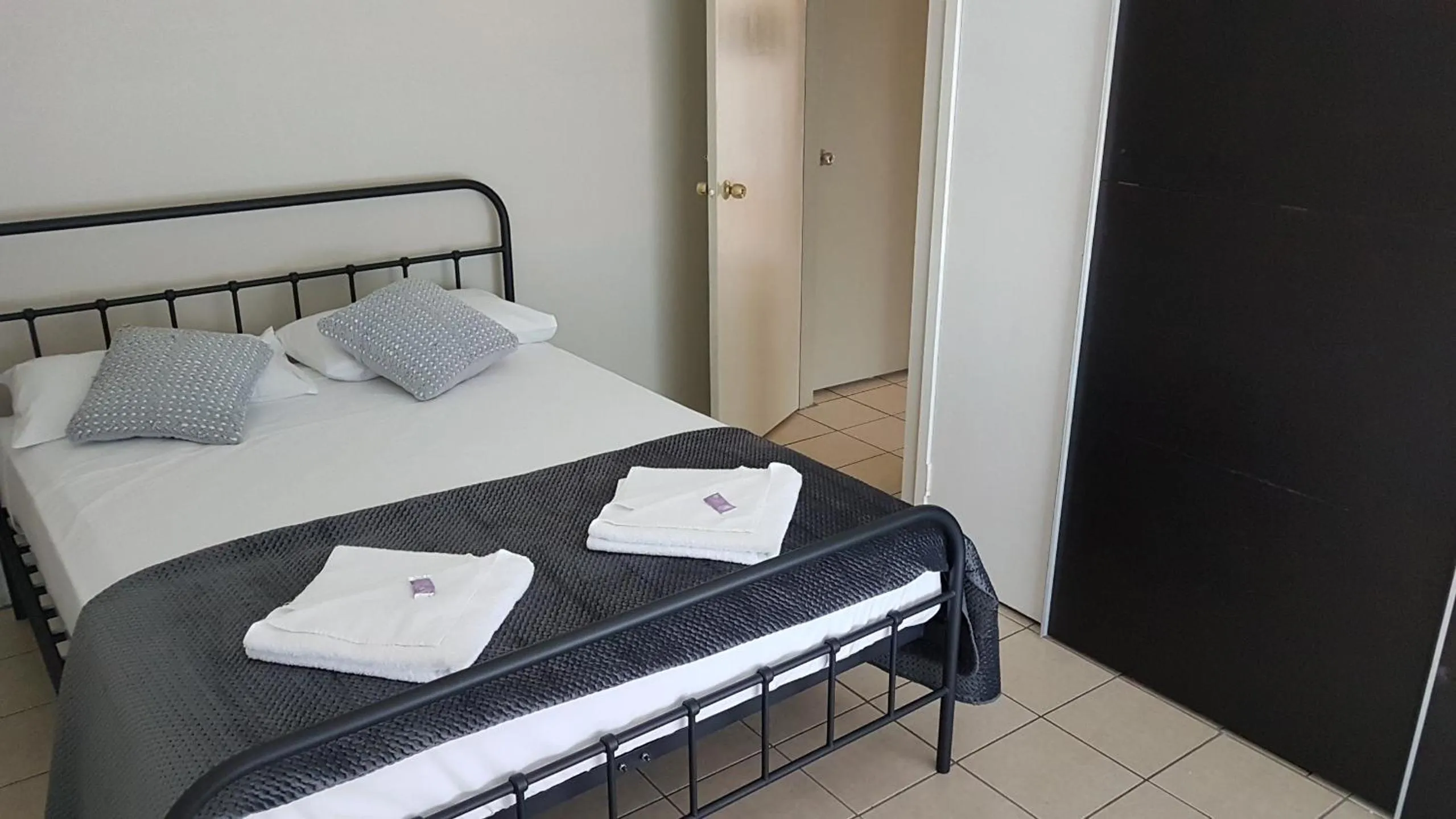 Bed in Welcome Home Motel Rockhampton