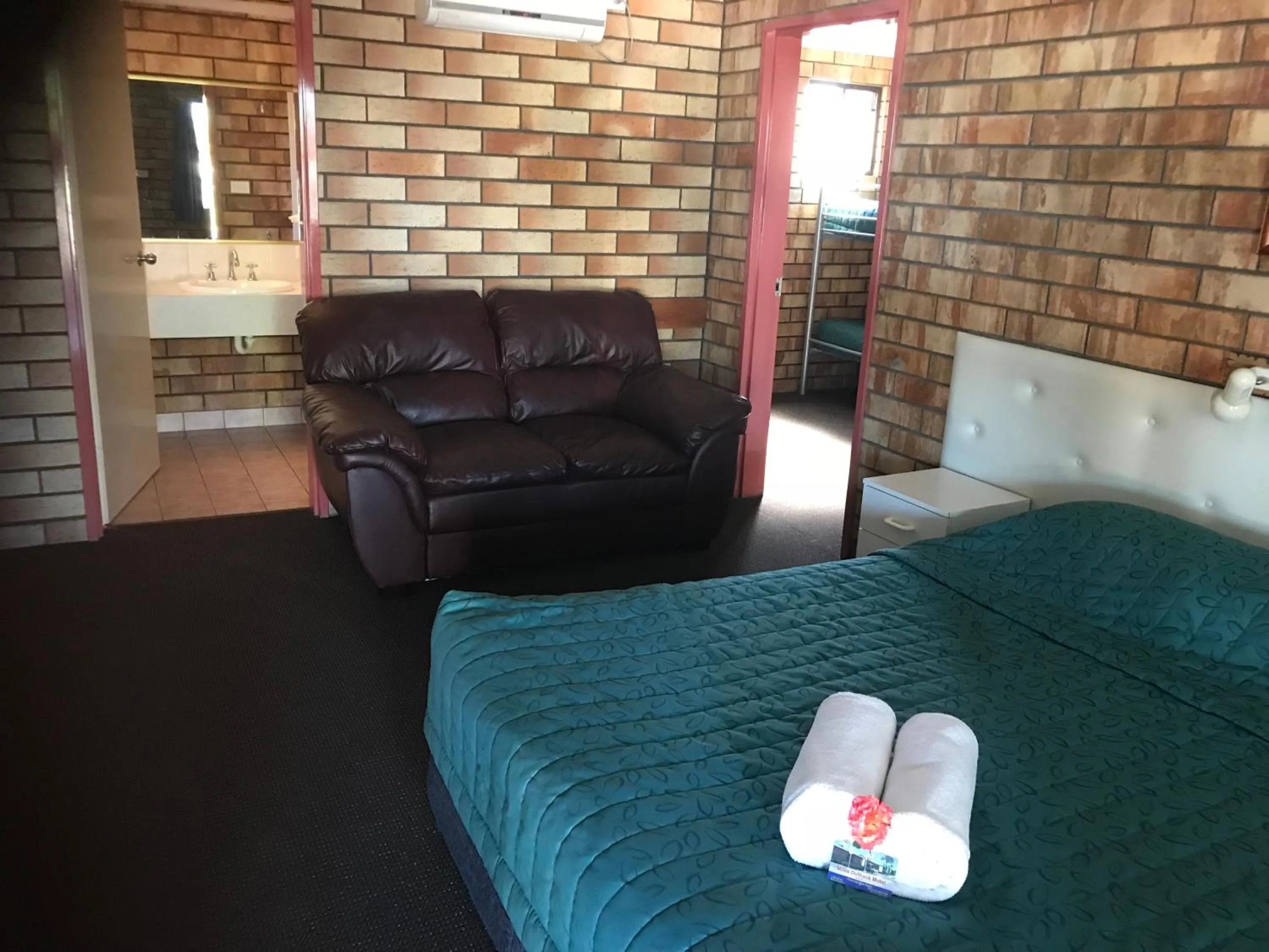 Bed in Miles Outback Motel