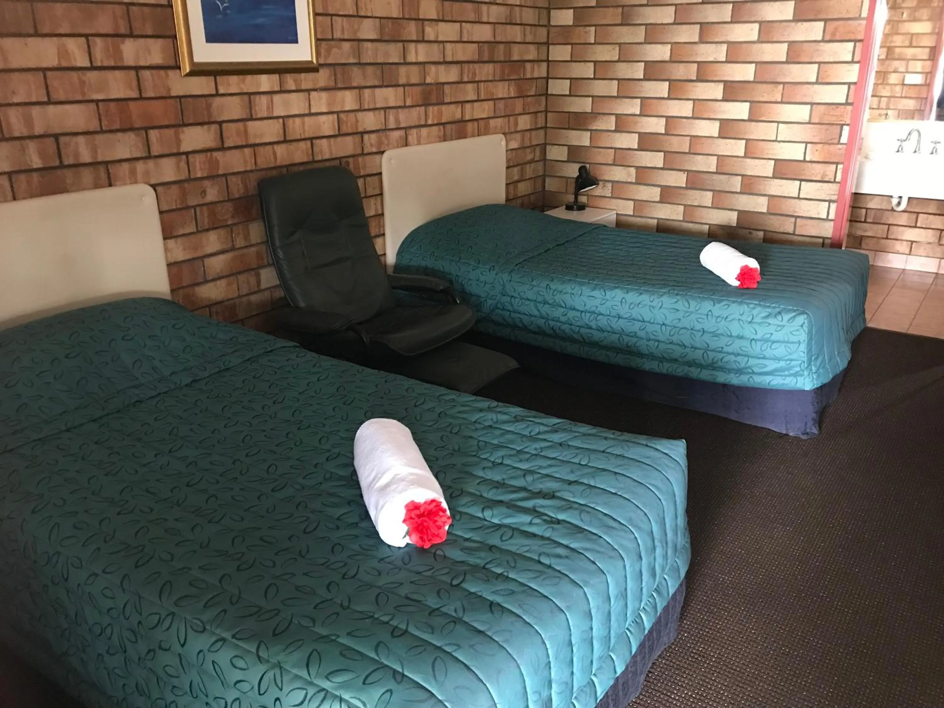 Bed in Miles Outback Motel