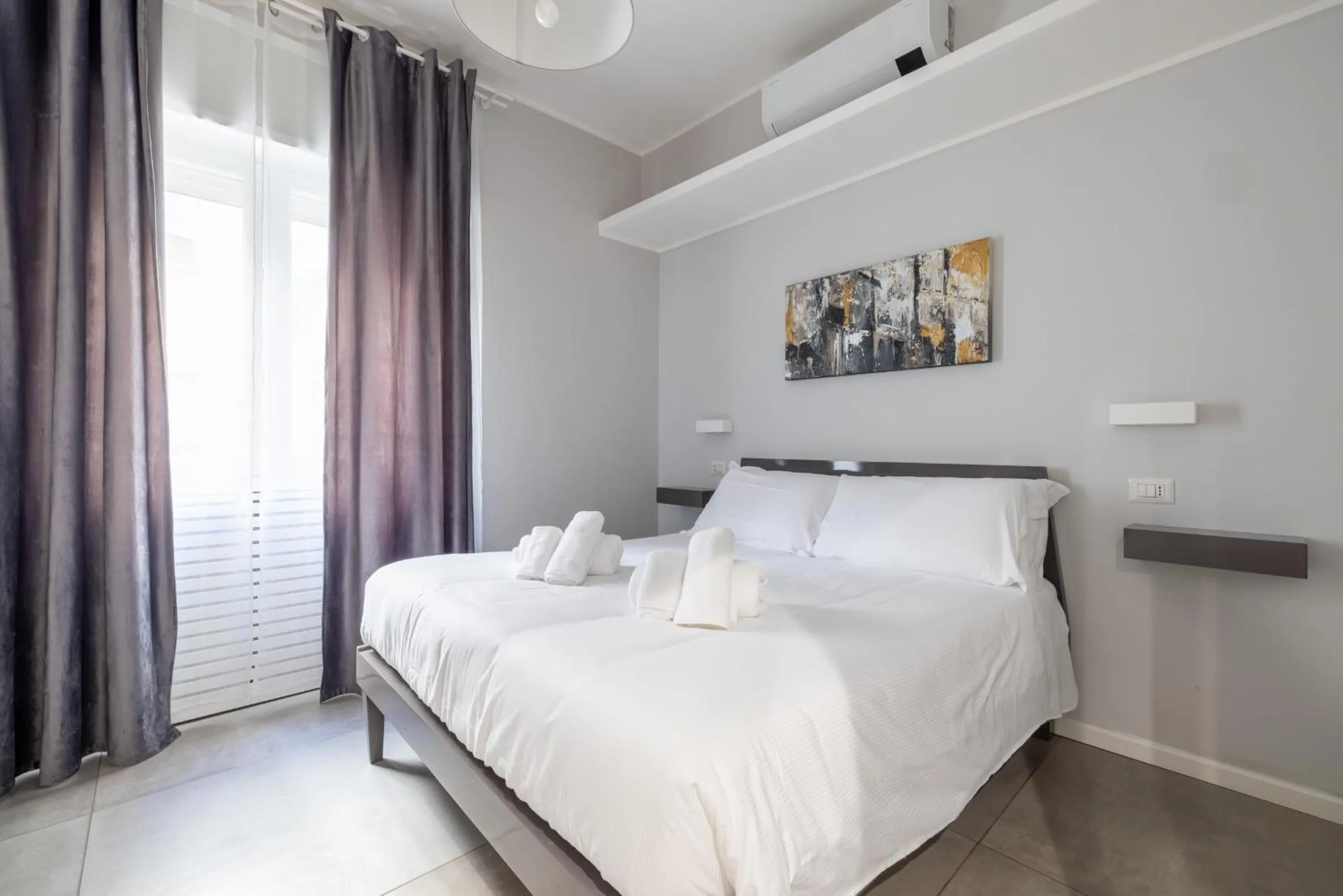 Bed in Belli Suites Vatican Rome Guest House