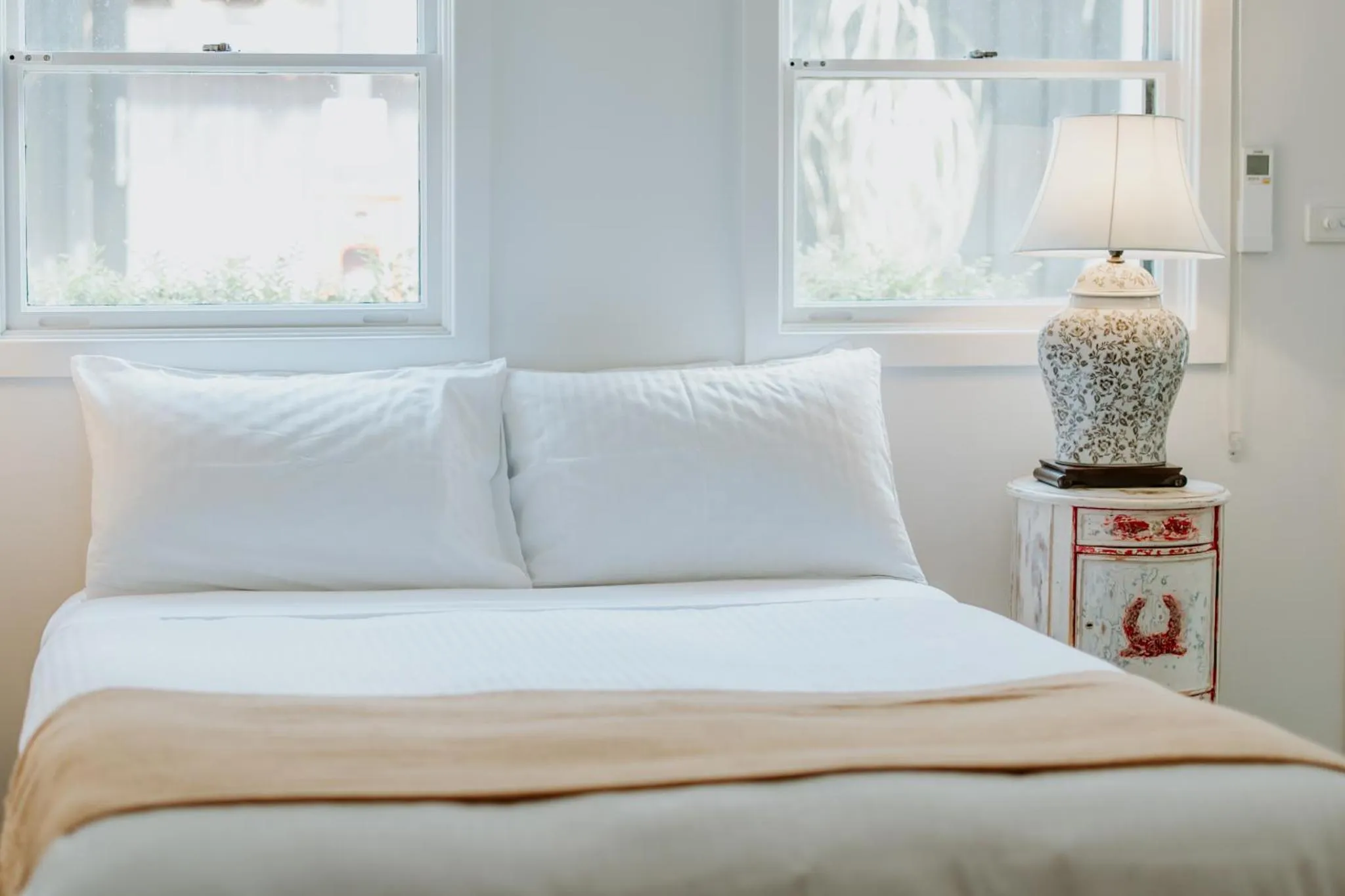 Bed in The Bronte Boutique Hotel