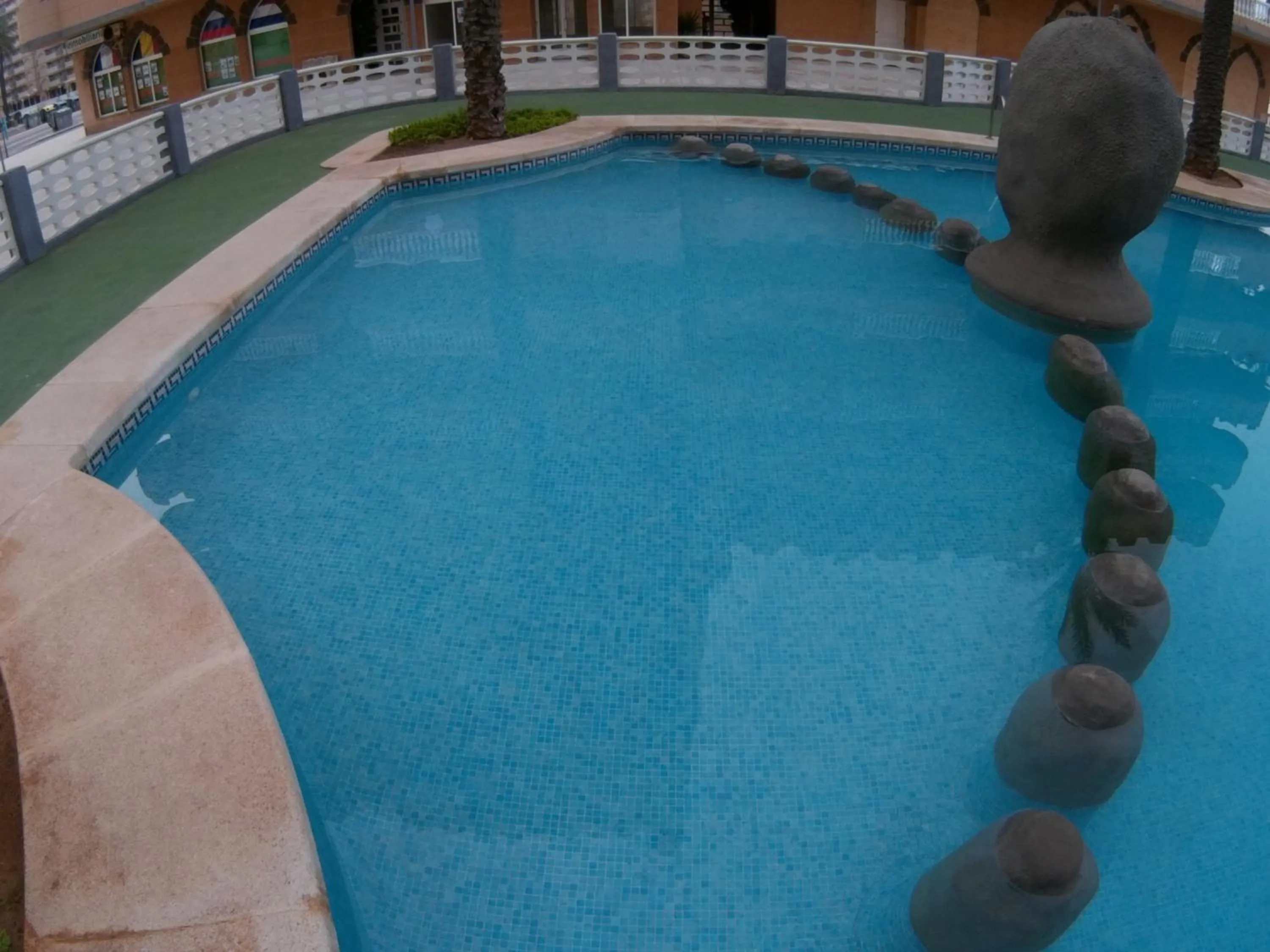 Swimming pool in Ático Castillo de Mar