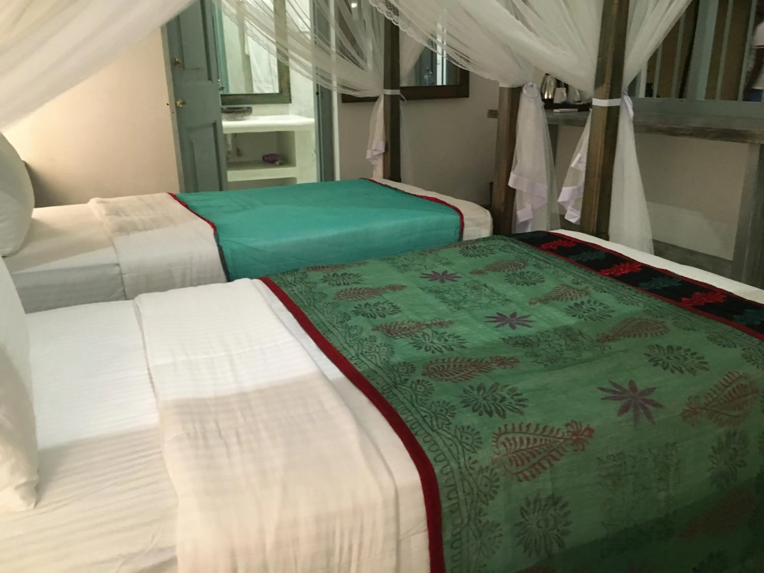 Bed in Khalid's Guest House