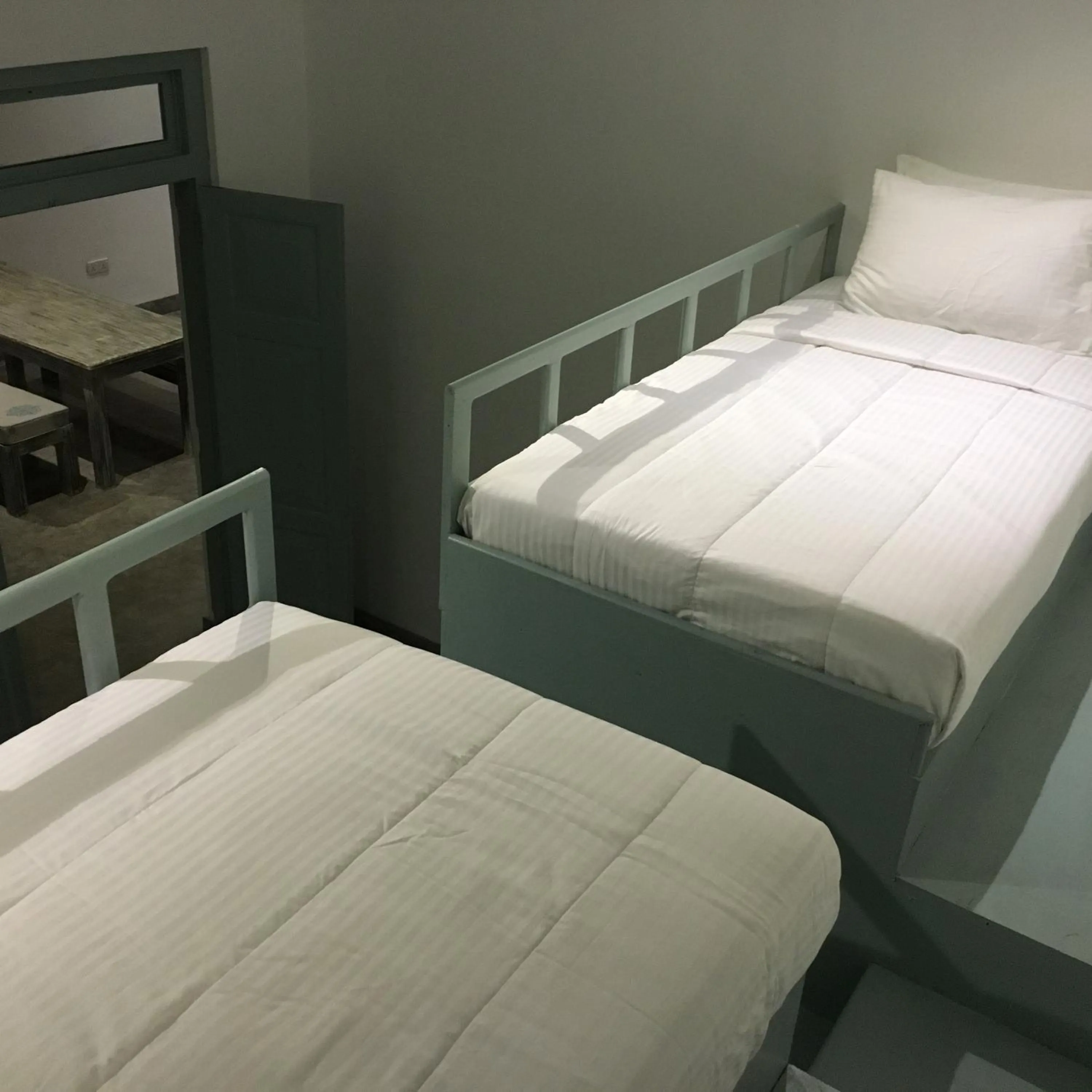 Bed in Khalid's Guest House