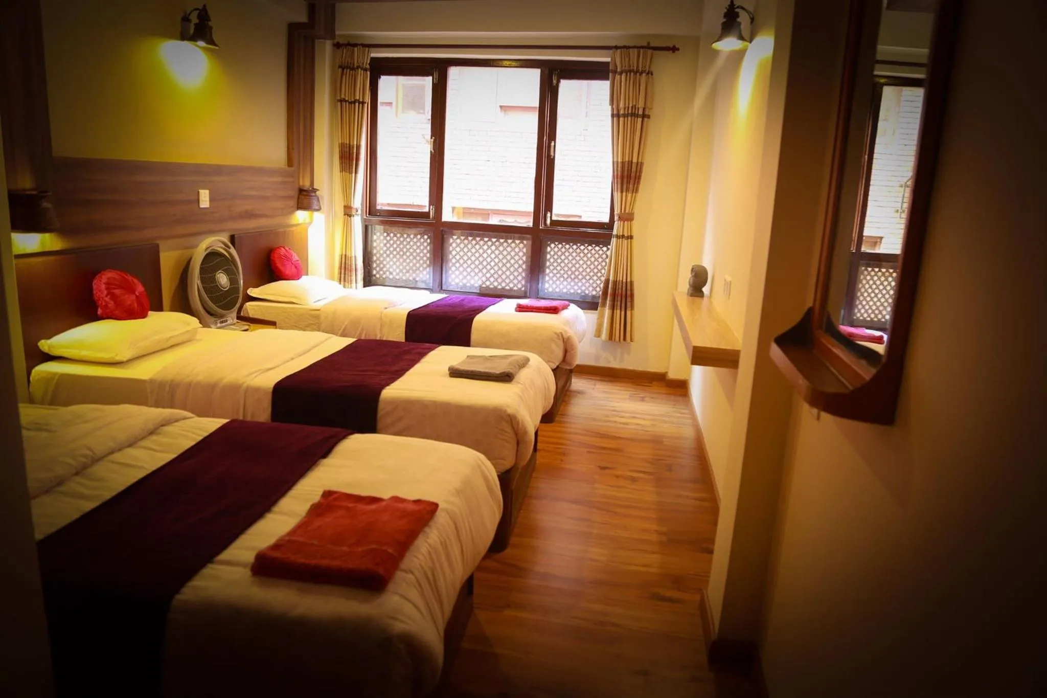 Bed in Kumari Guest House