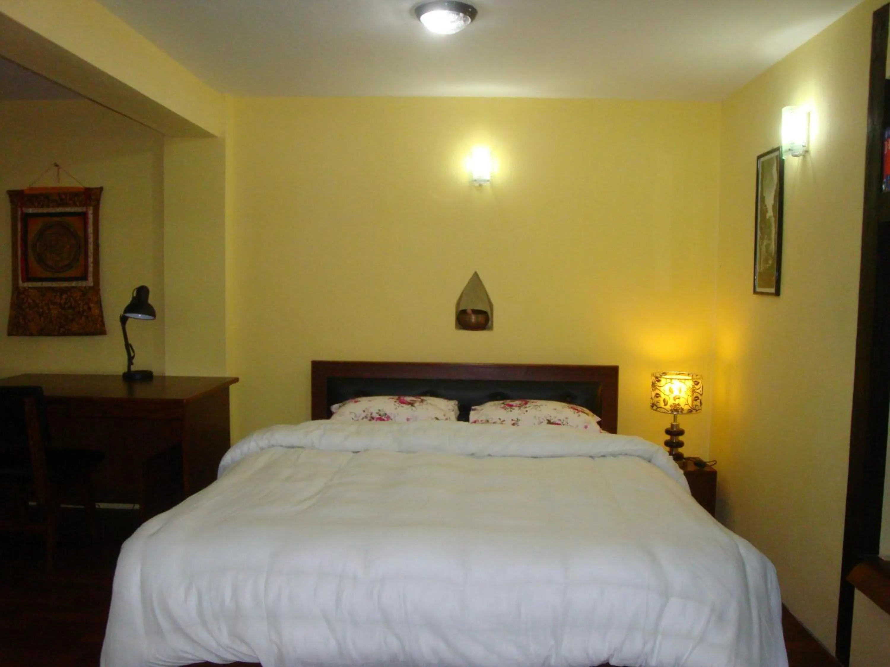 Bed in Kumari Guest House