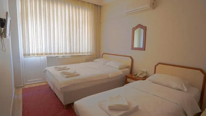 Bed in AKÇAY LEMAN OTEL