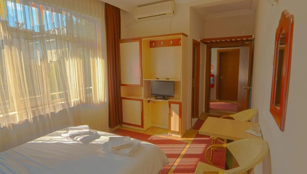 Photo of the whole room, Bed in AKÇAY LEMAN OTEL