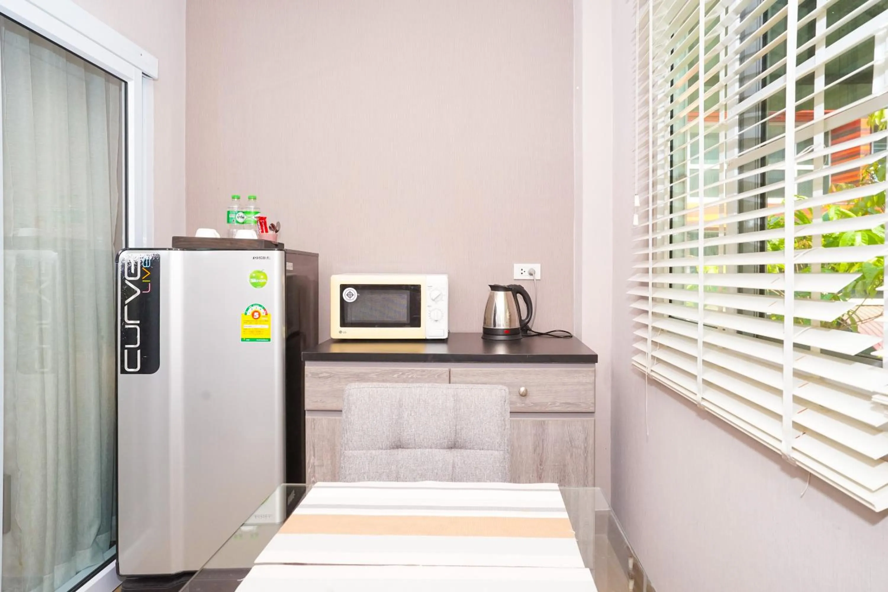 Photo of the whole room in Blue cafe Apartments