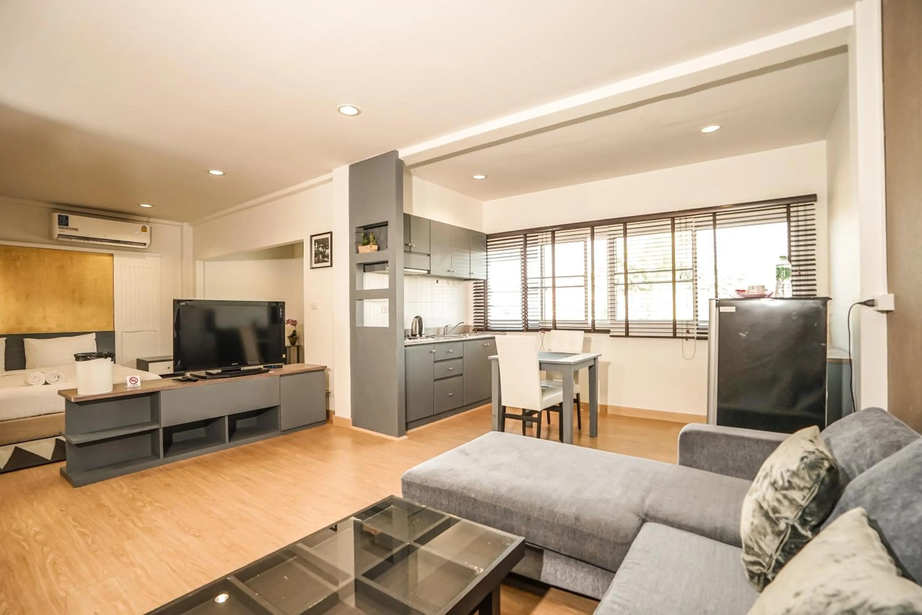 Bedroom in Blue cafe Apartments