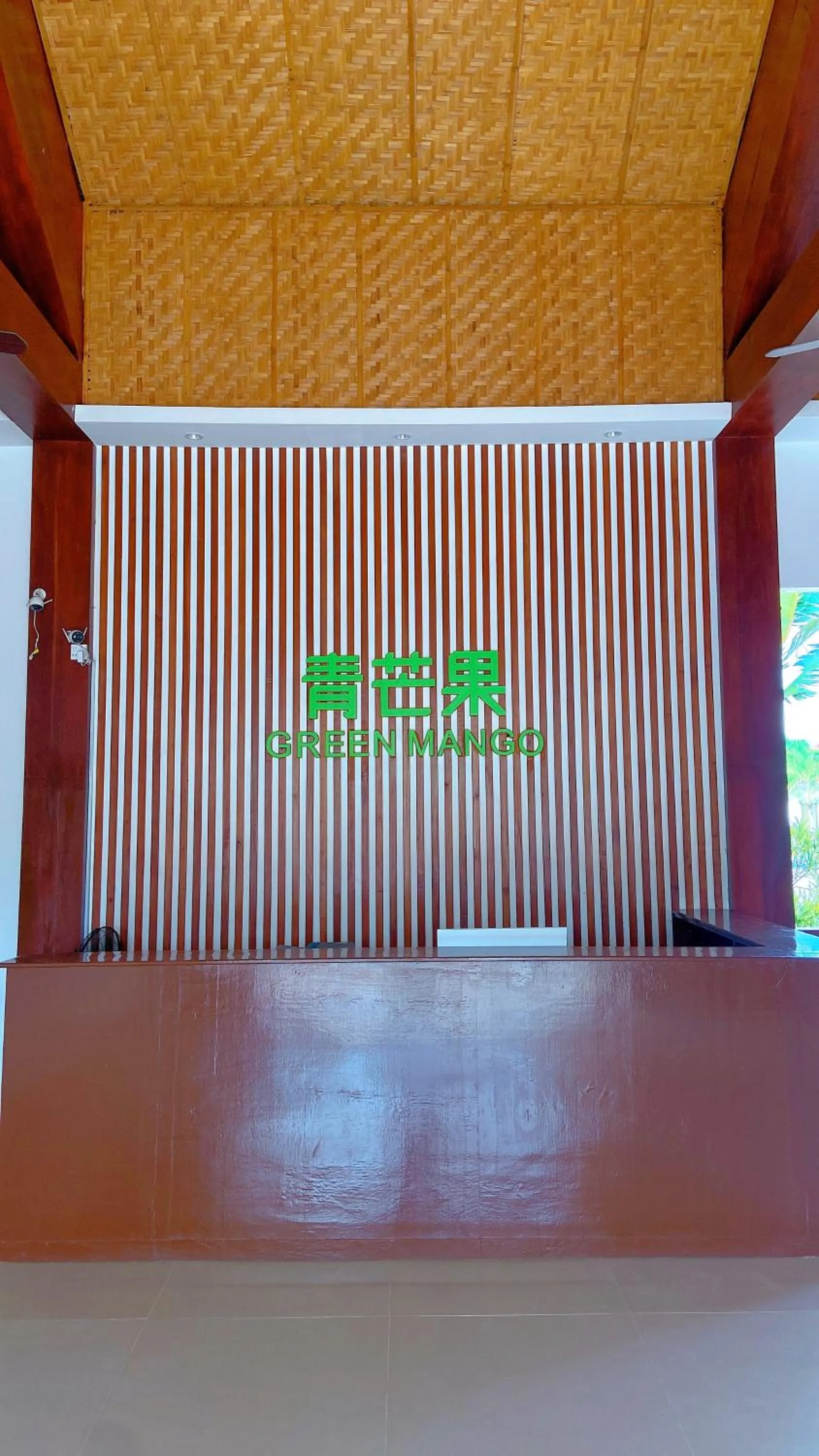 Property logo or sign in Green Mango Resort