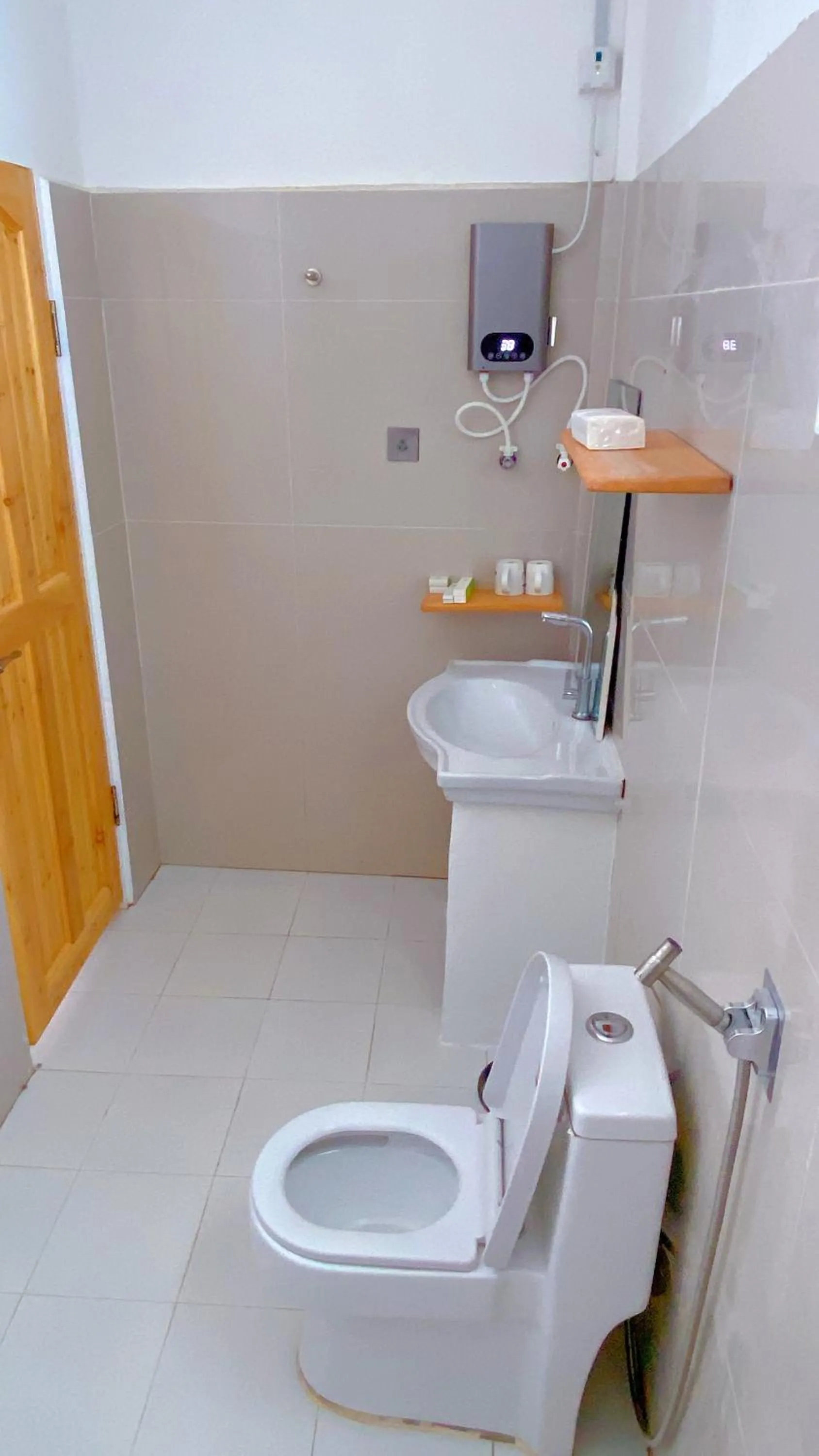 Toilet in Green Mango Resort