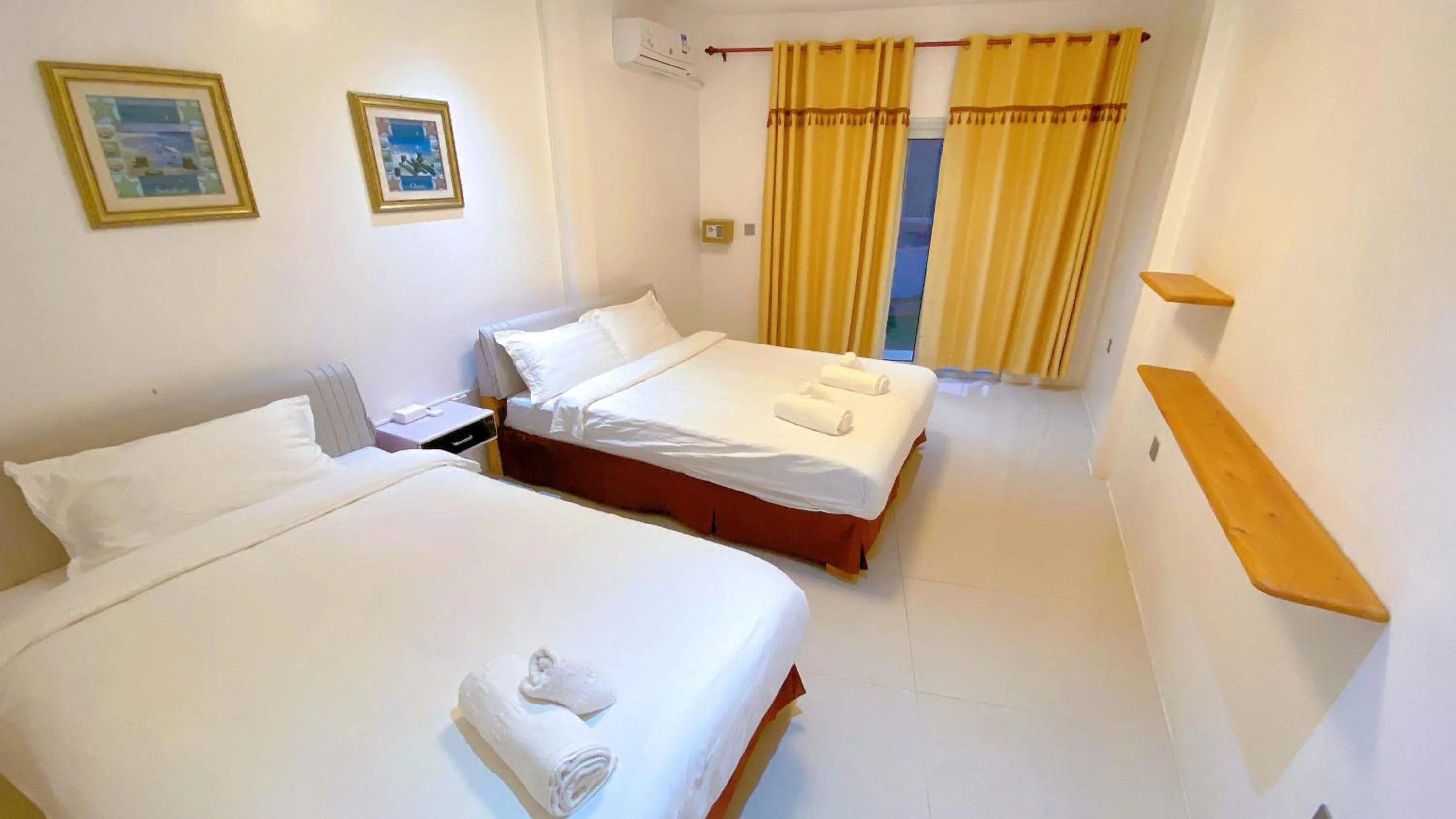 Bed in Green Mango Resort