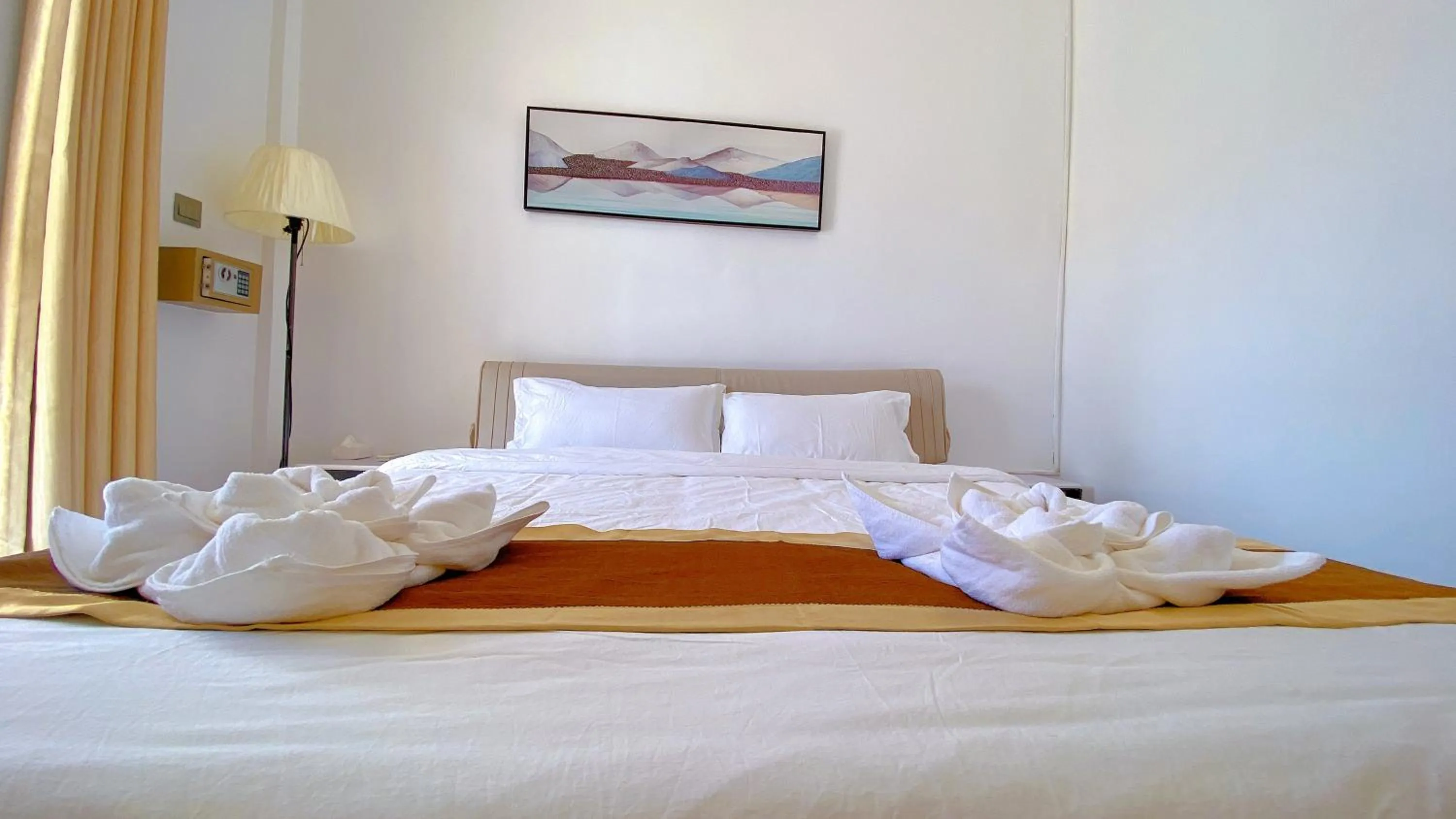 Bed in Green Mango Resort