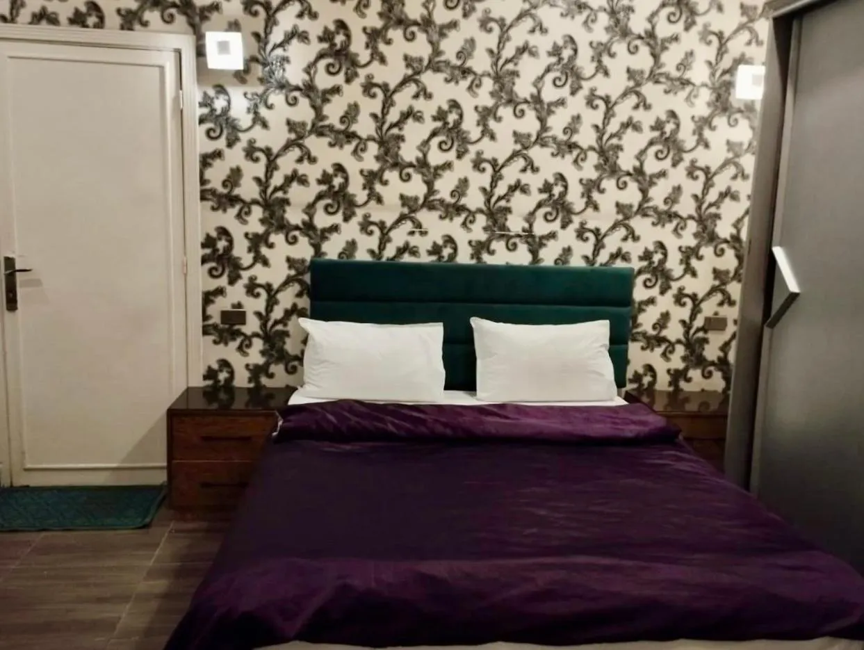 Bed in Hotel Richmond Down Town