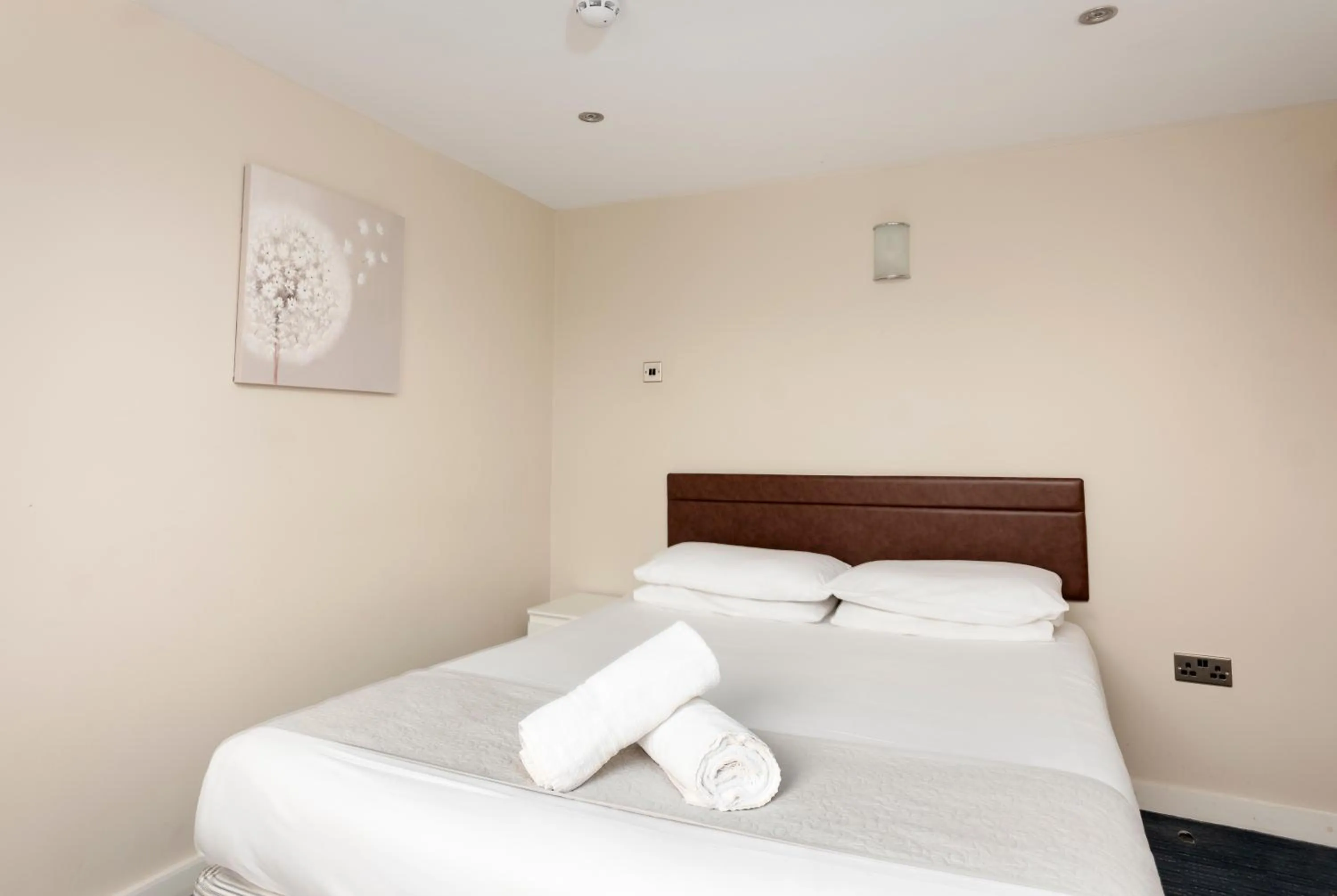 Bedroom, Bed in The R Inn Hotel