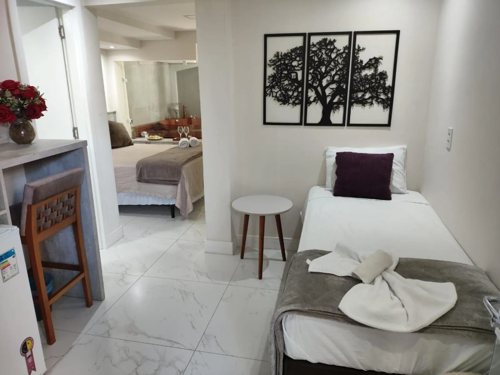 Bed in Bombinhas Guest House