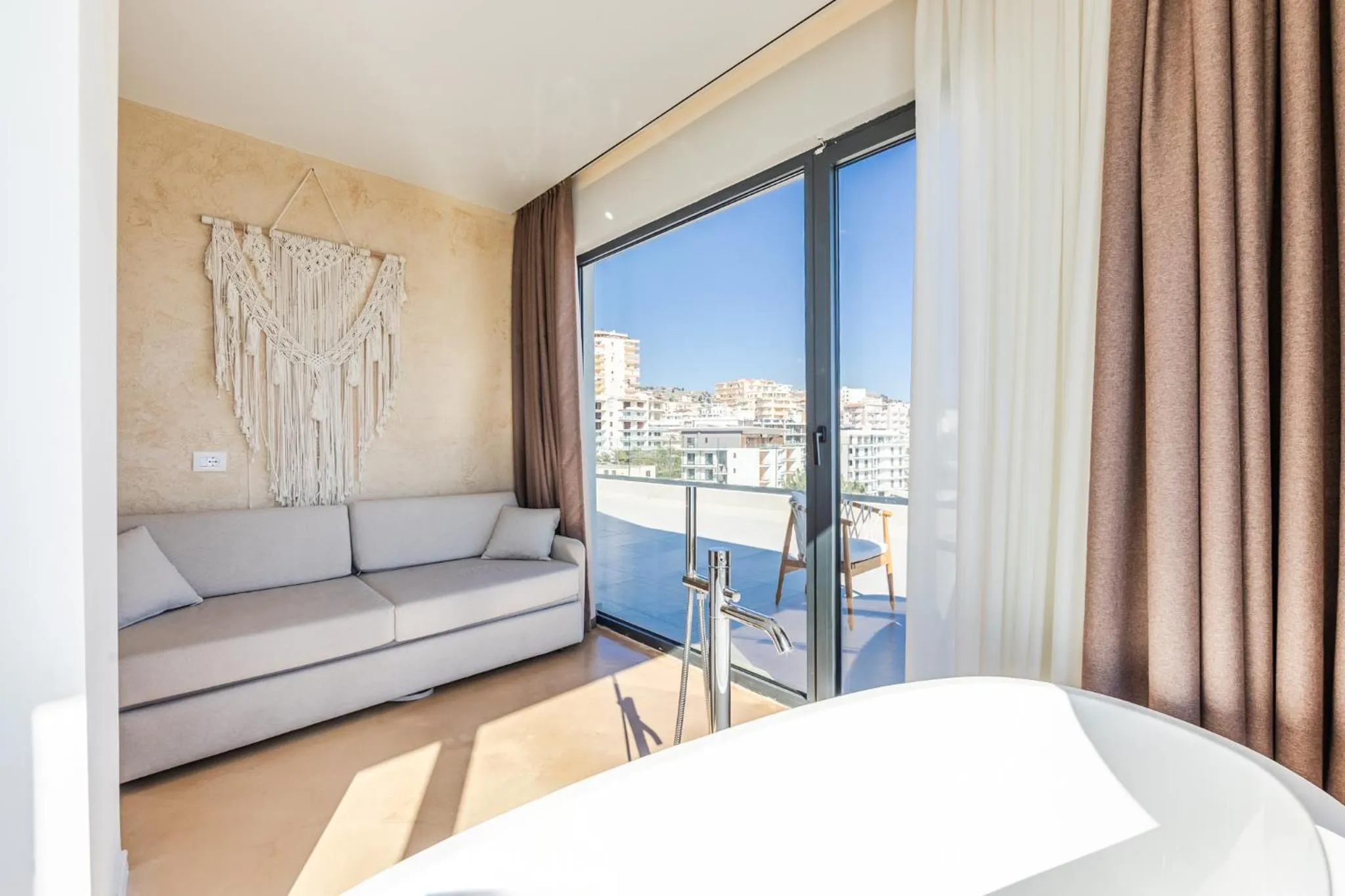 Seating area, Bed in San Angelo Luxury Resort & Spa - Adults Only