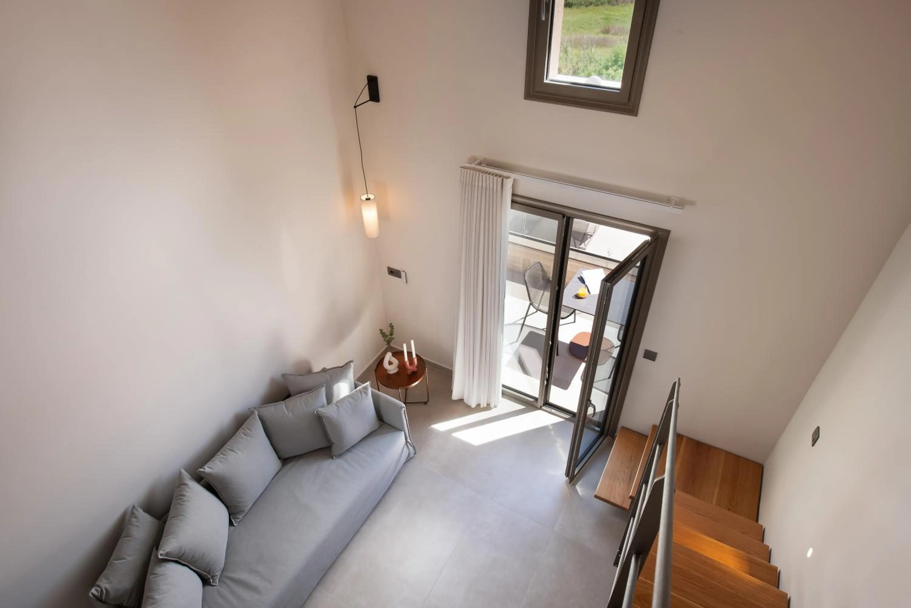 Bed in Reveli Suites