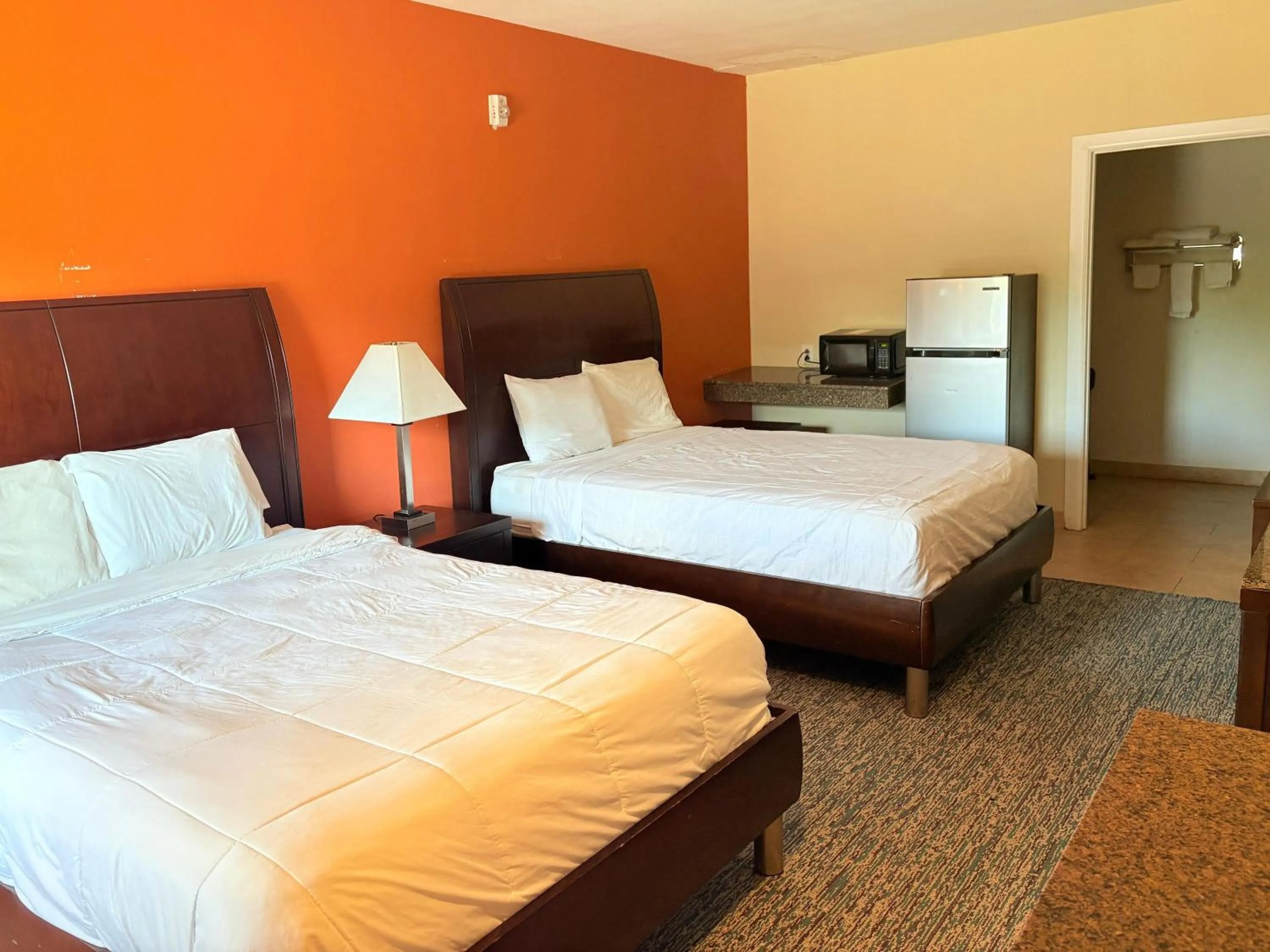 2 Queen Beds with Kitchenette in Westwood Inn Extended Stay by OYO Gonzales TX