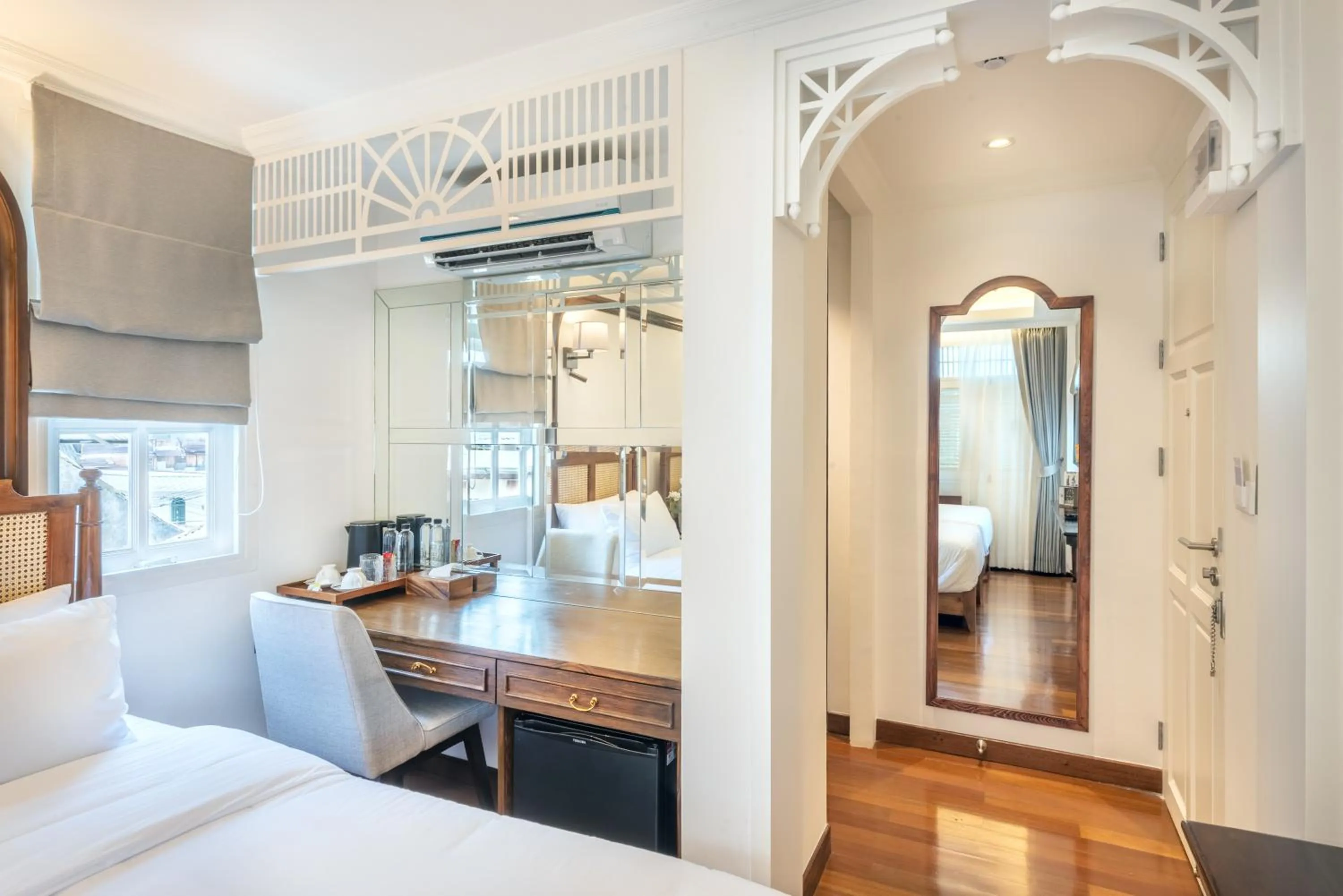 Bed in Cherie Bangkok Boutique Hotel