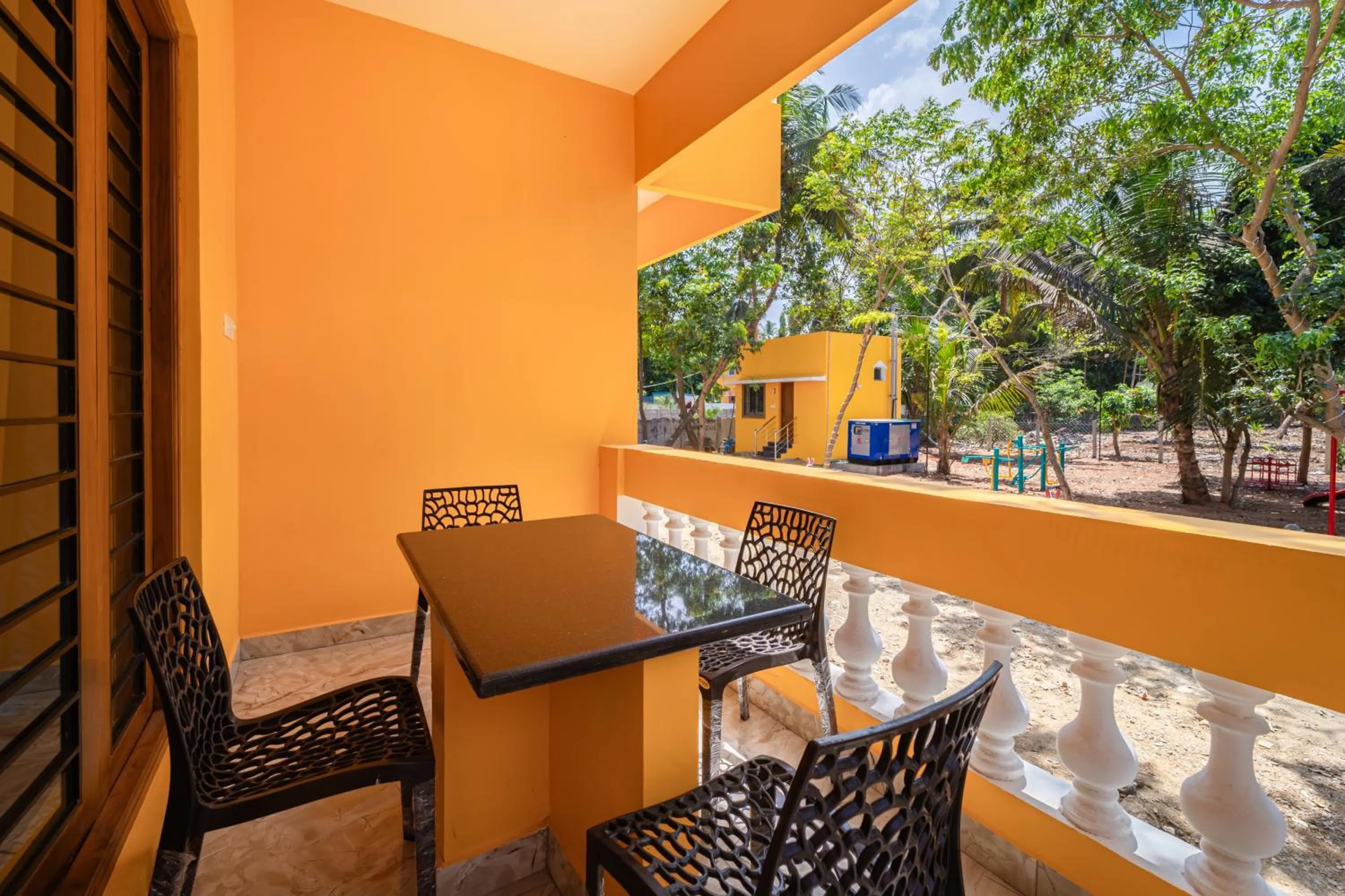Seating area in Teak Leaf Gateway Villa with Swimming Pool Indoor Games