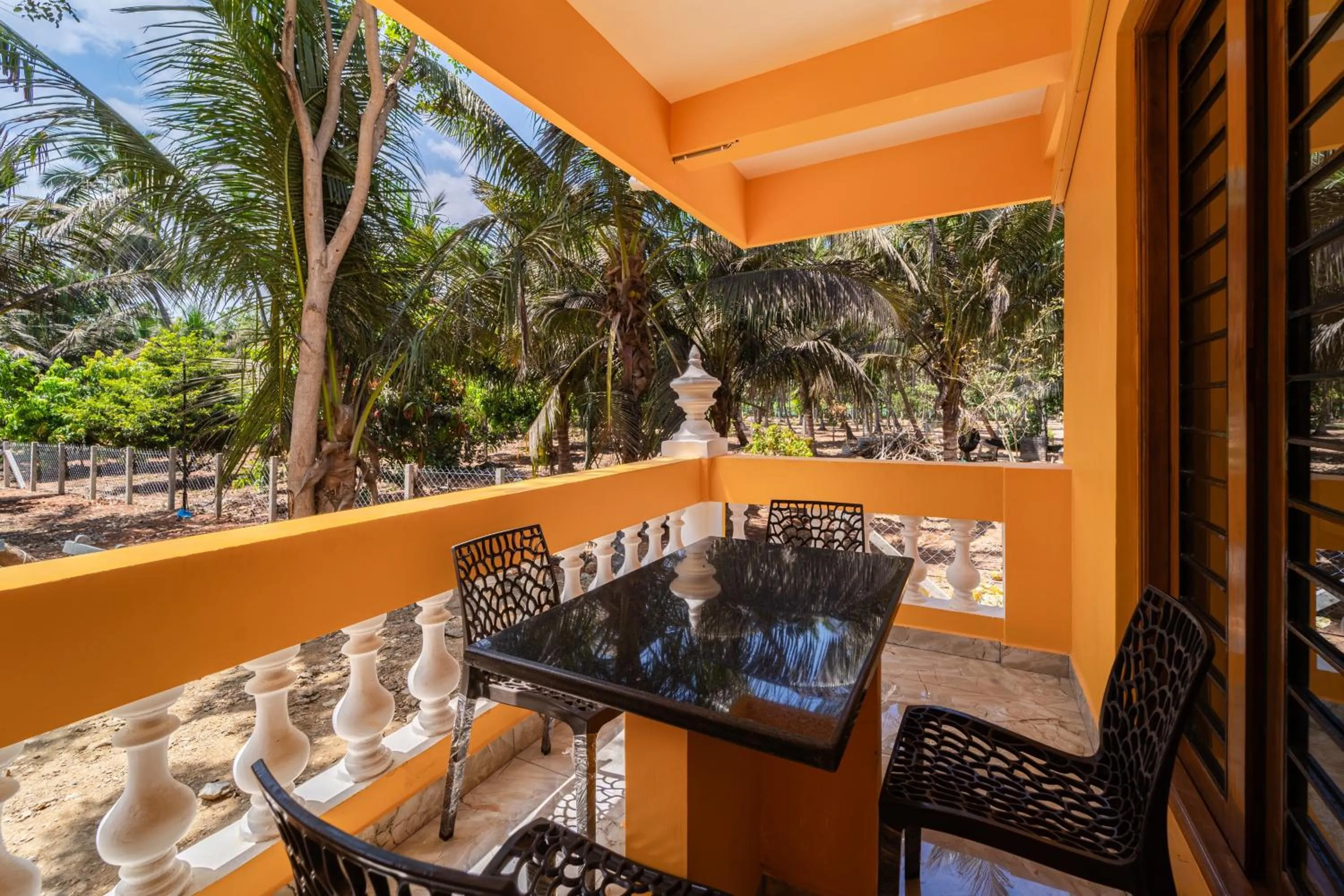 Seating area in Teak Leaf Gateway Villa with Swimming Pool Indoor Games
