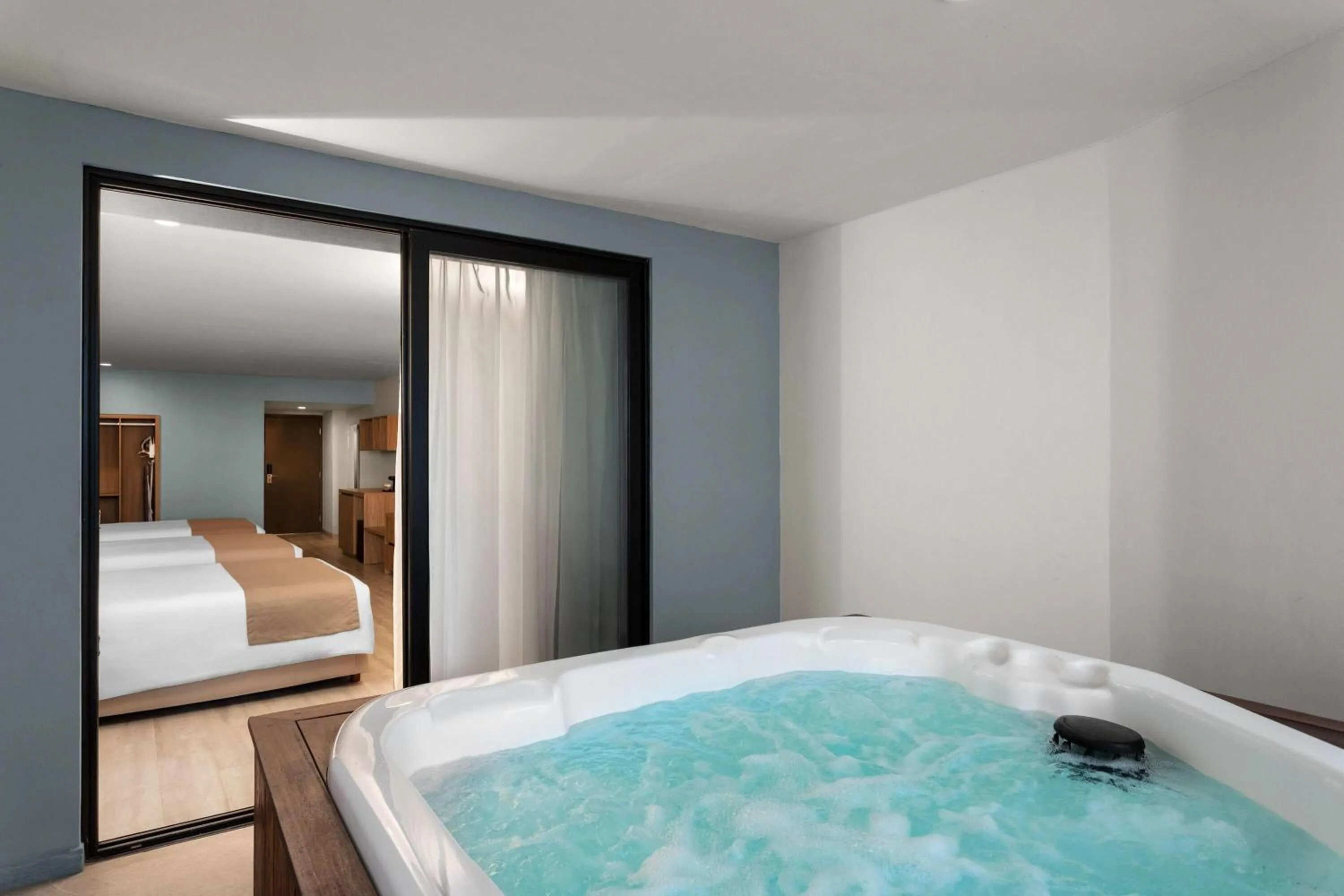 Photo of the whole room, Bed in Wyndham Garden Mazatlan Marina