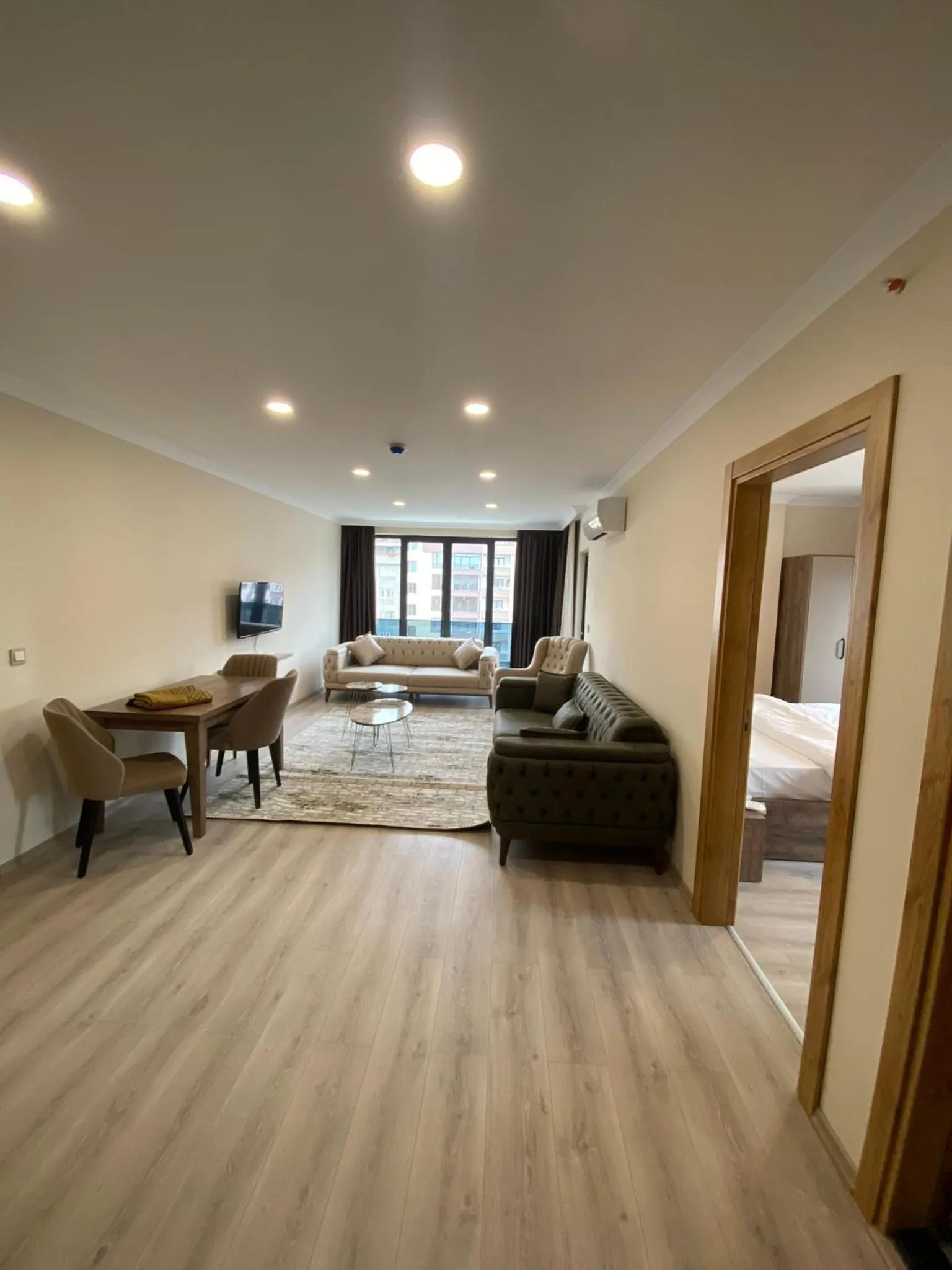 Bed in Rena Grand Residence & Suit