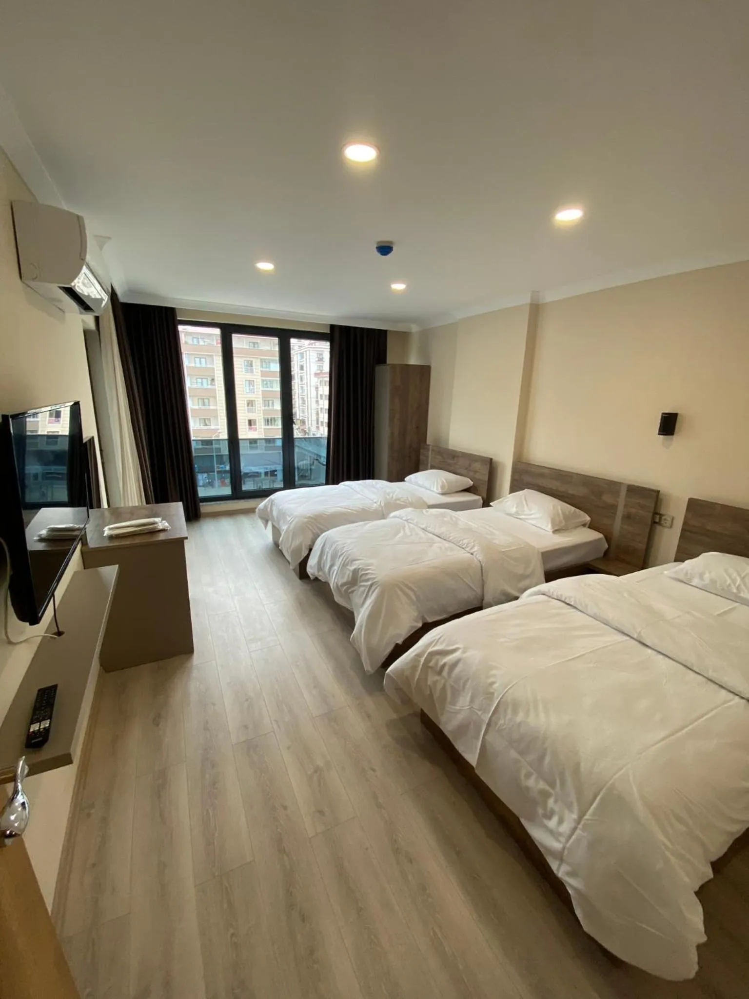 Bed in Rena Grand Residence & Suit