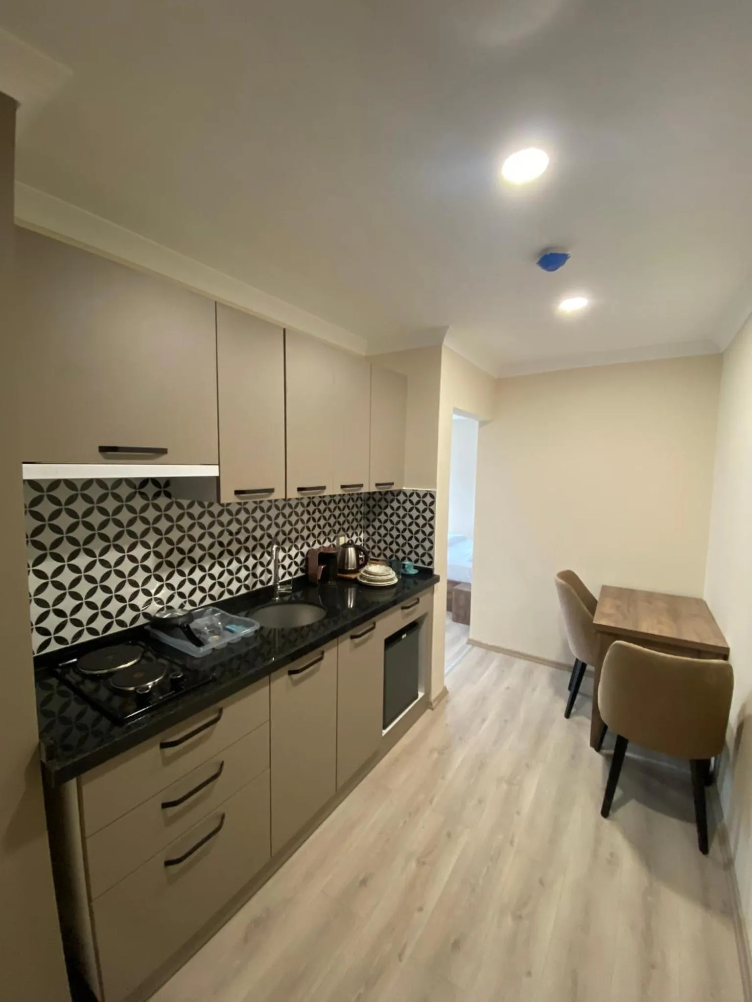 Kitchen or kitchenette in Rena Grand Residence & Suit