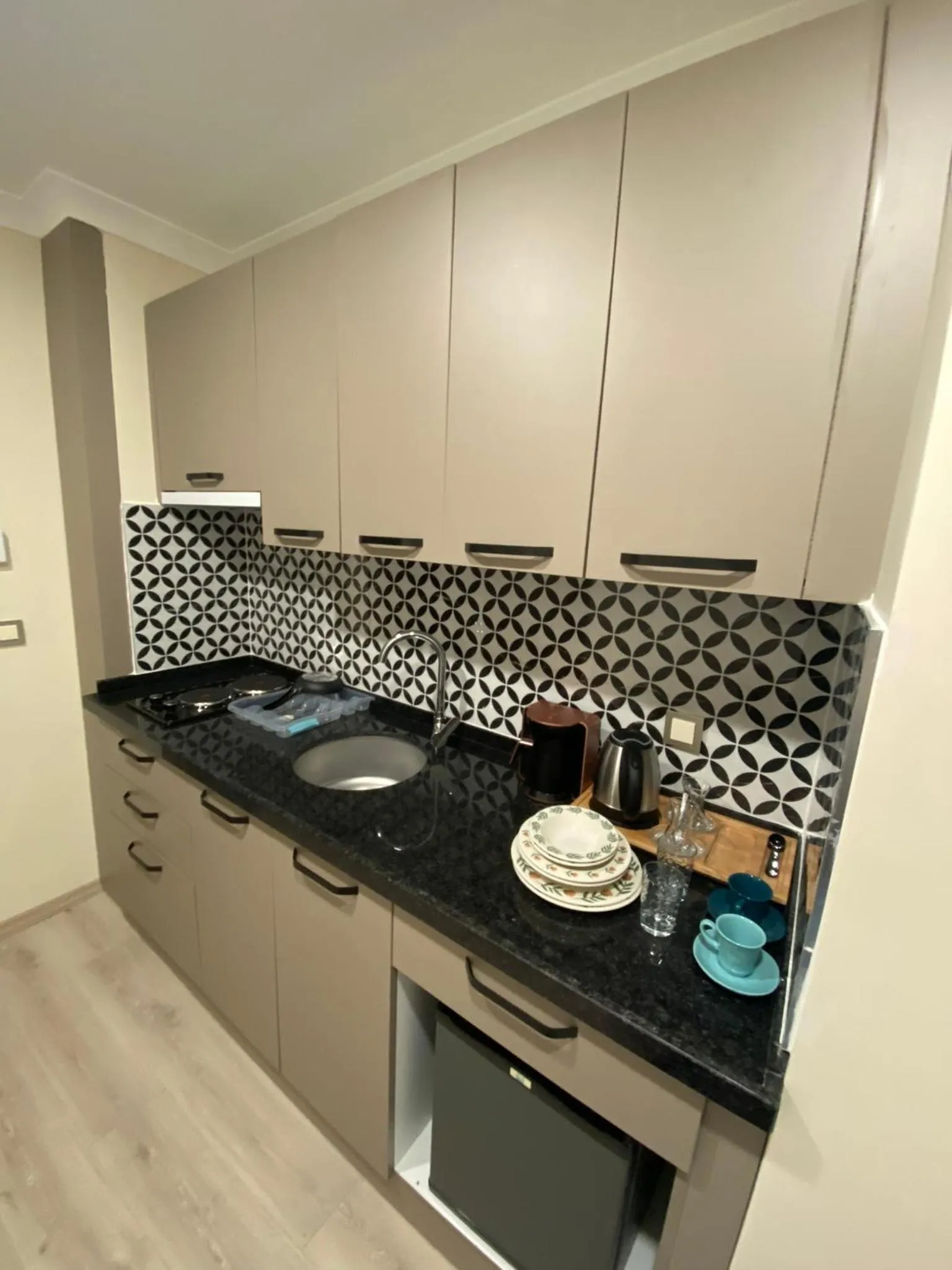 Kitchen or kitchenette in Rena Grand Residence & Suit
