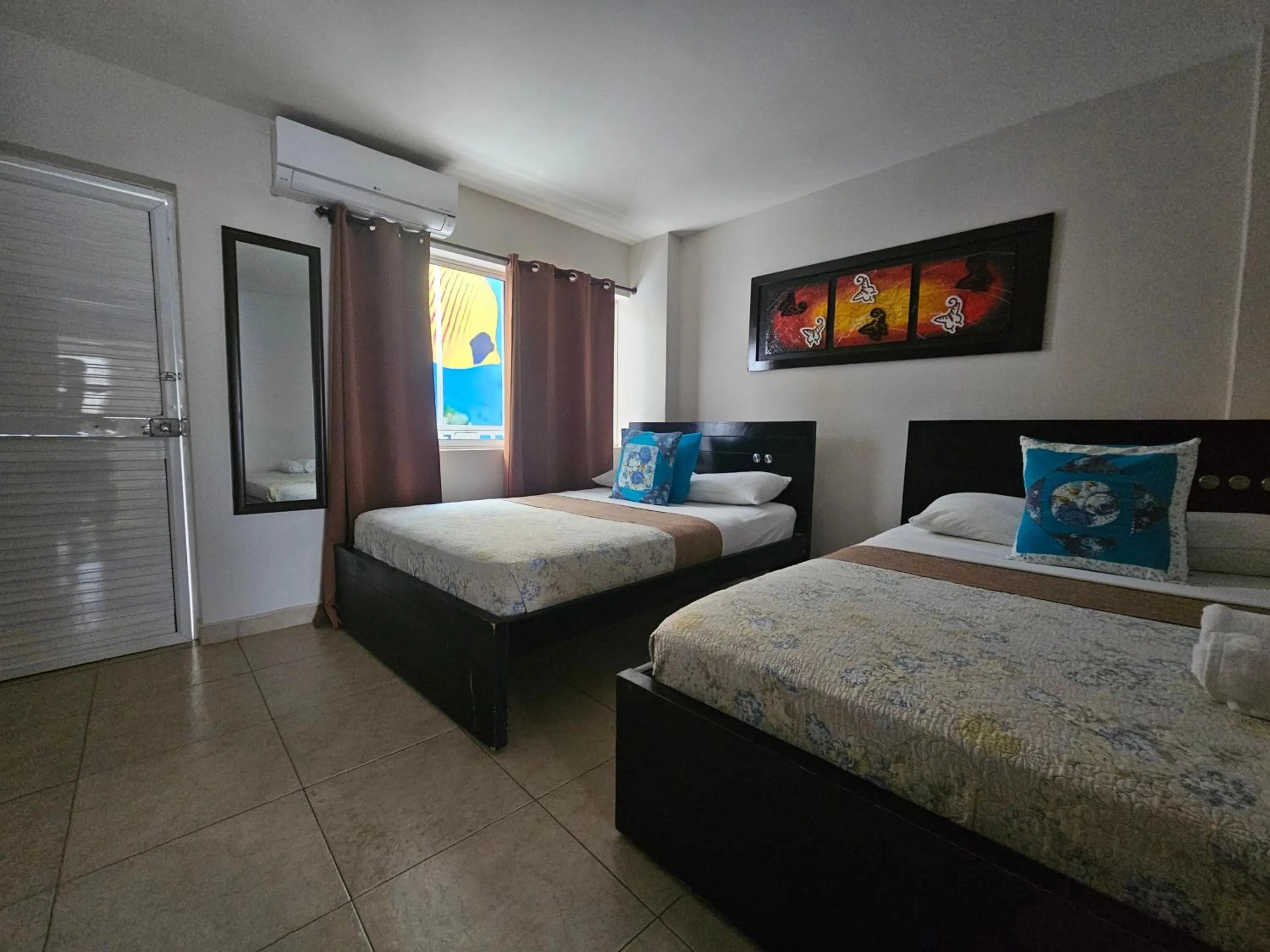 Photo of the whole room, Bed in Caribbean Island Hotel Piso 2