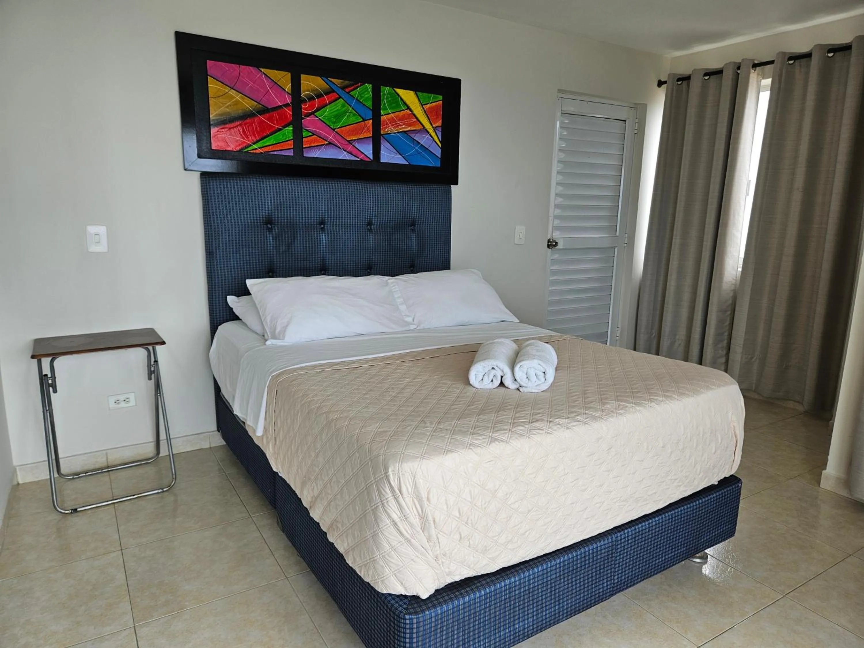 Bed in Caribbean Island Hotel Piso 2