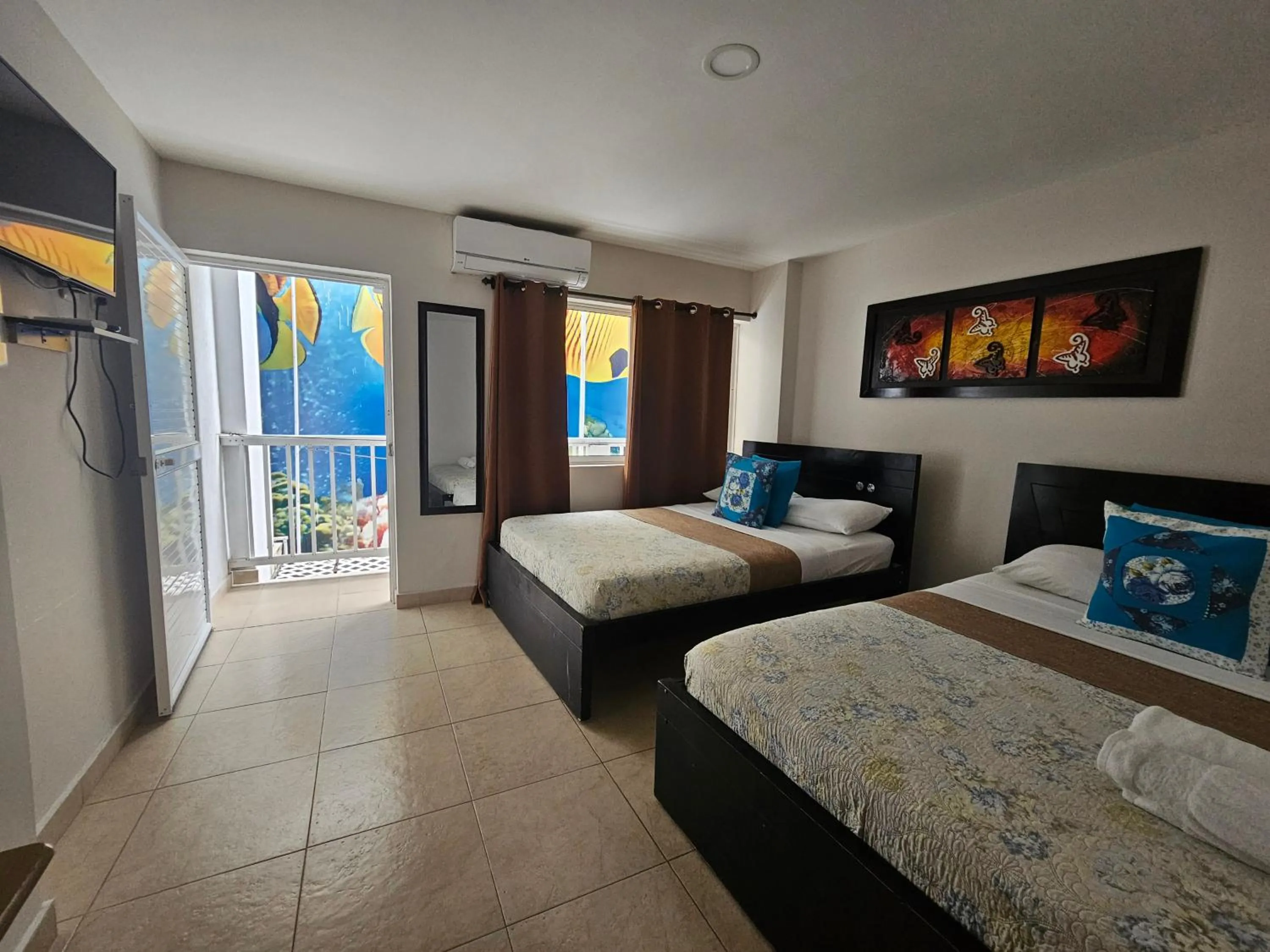 Photo of the whole room, Bed in Caribbean Island Hotel Piso 2