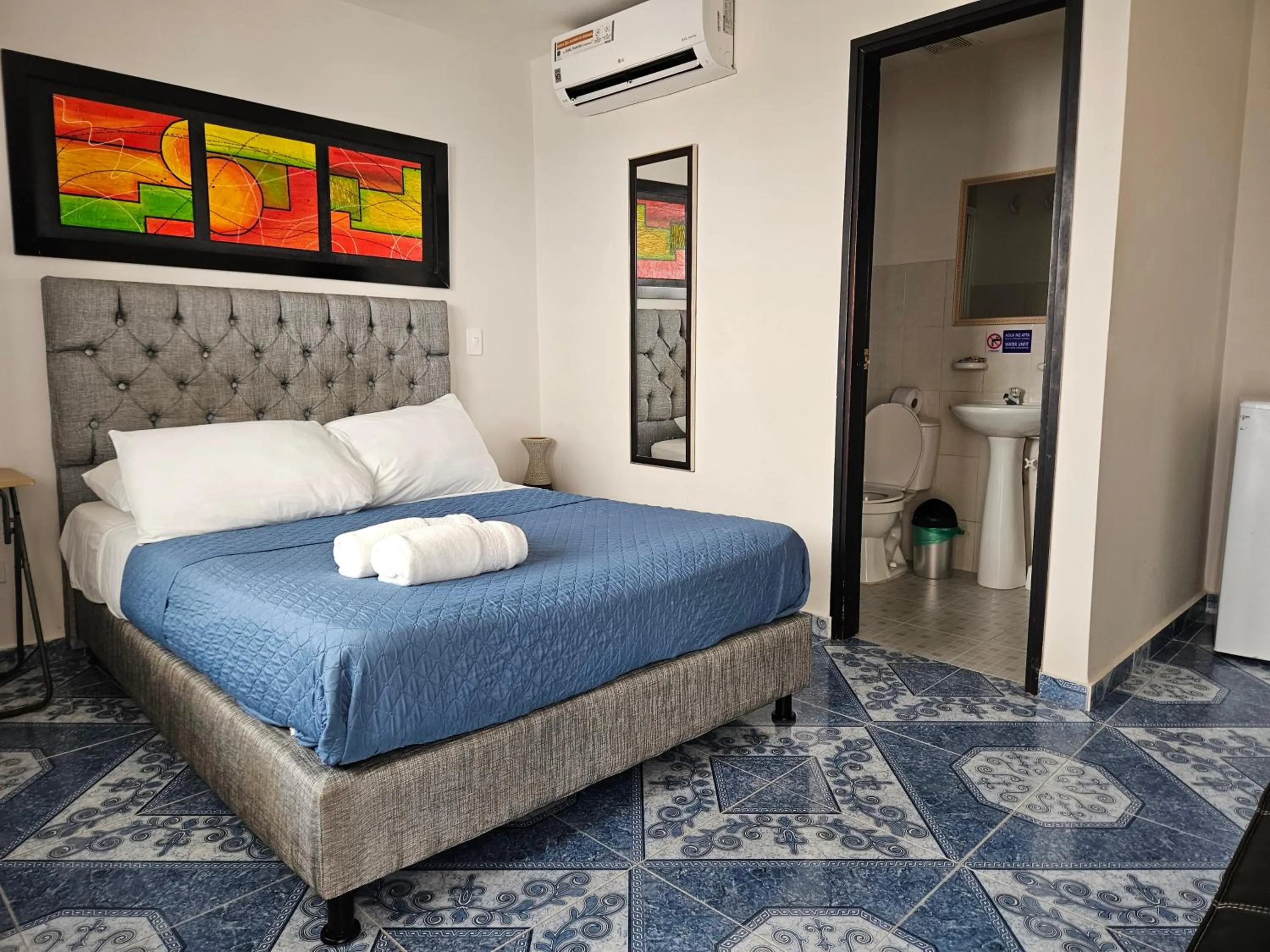 Bed in Caribbean Island Hotel Piso 2