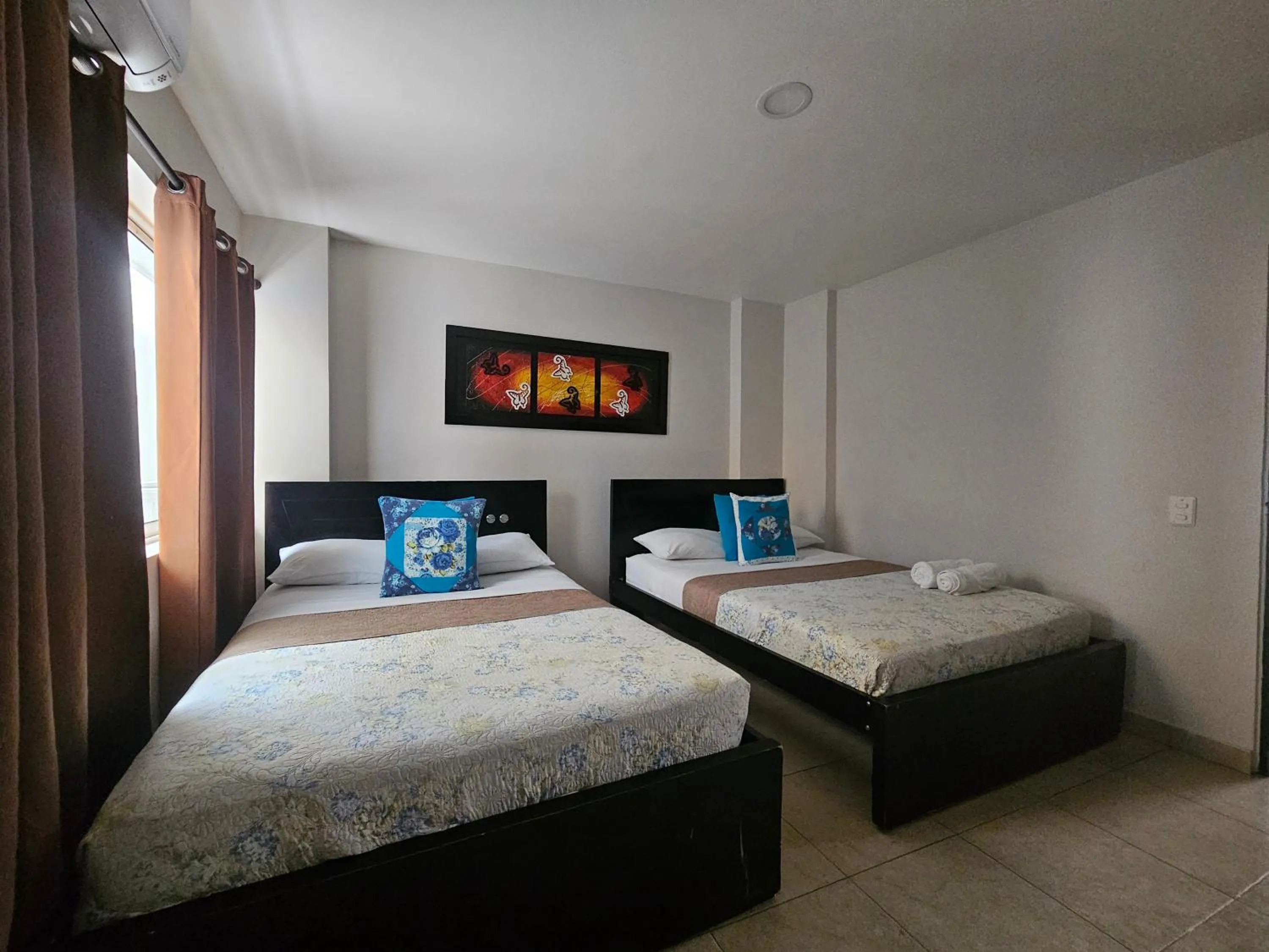 Bed in Caribbean Island Hotel Piso 2