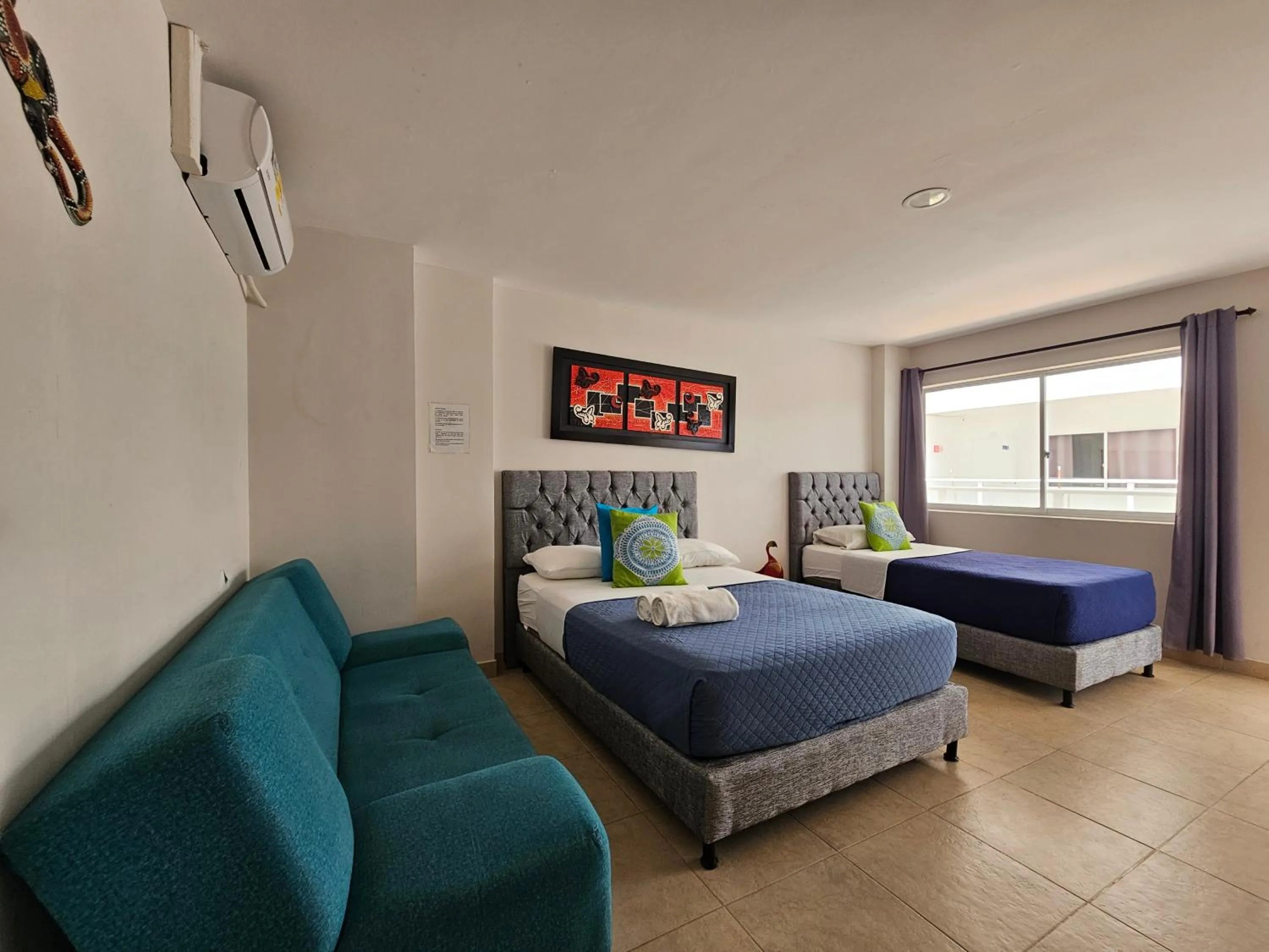 Photo of the whole room, Bed in Caribbean Island Hotel Piso 2