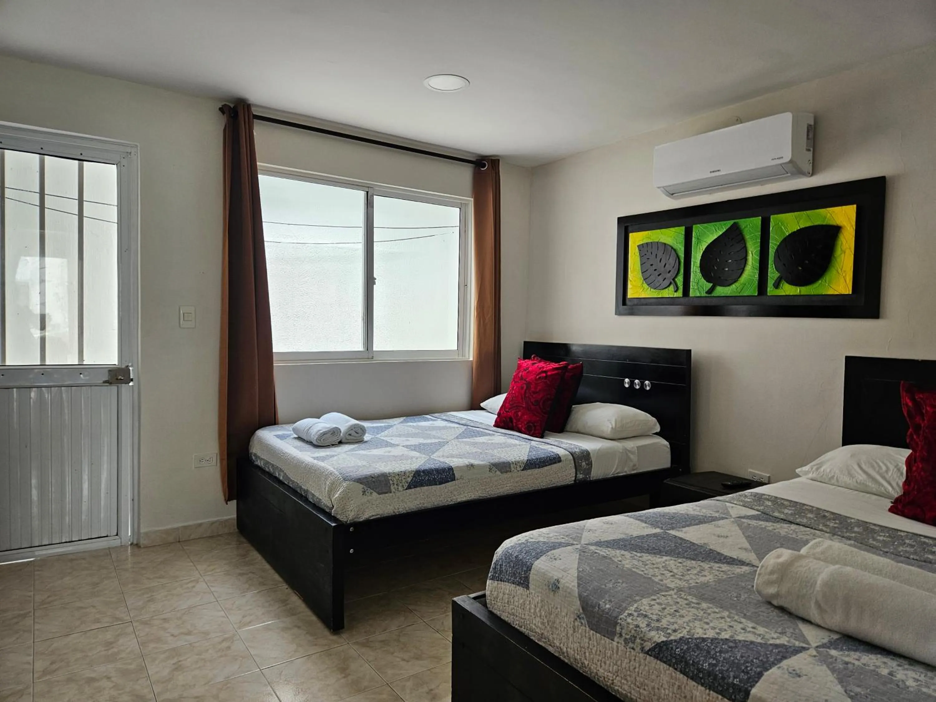 Bed in Caribbean Island Hotel Piso 2